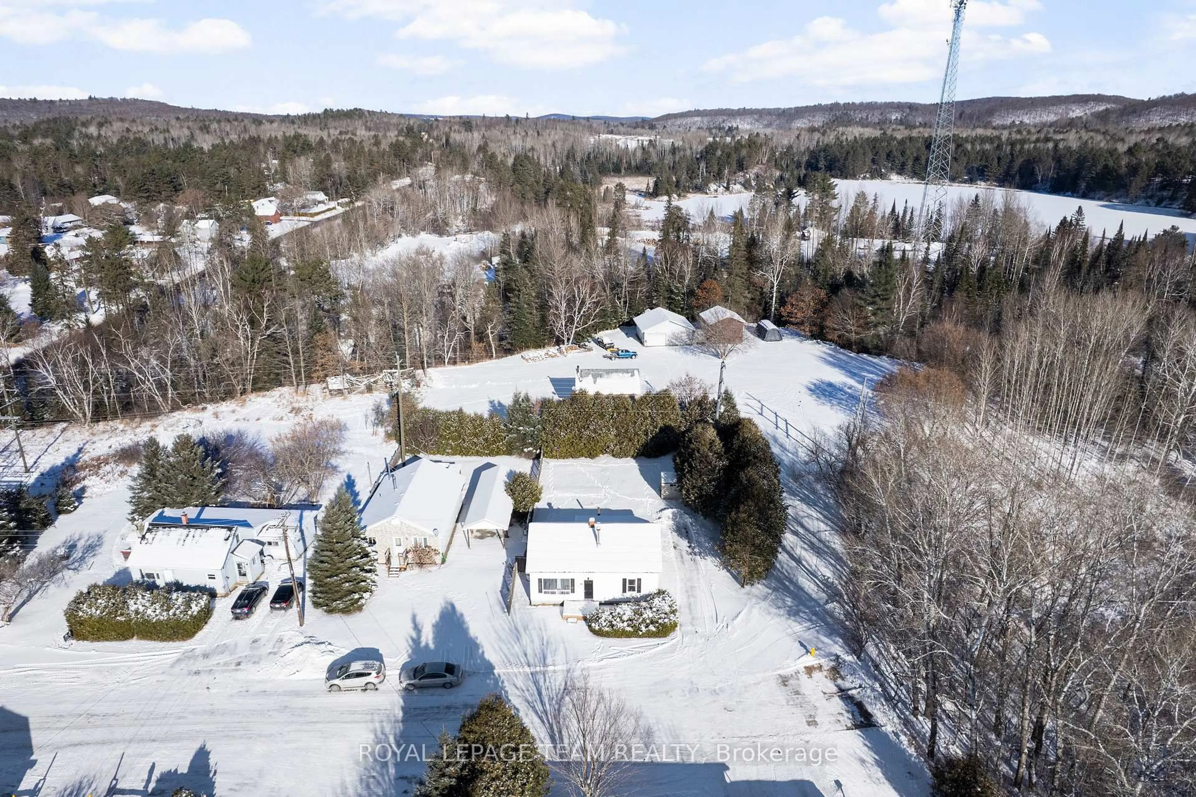 A pic from outside/outdoor area/front of a property/back of a property/a pic from drone, mountain view for 21 Philip St, Barry's Bay Ontario K0J 1B0