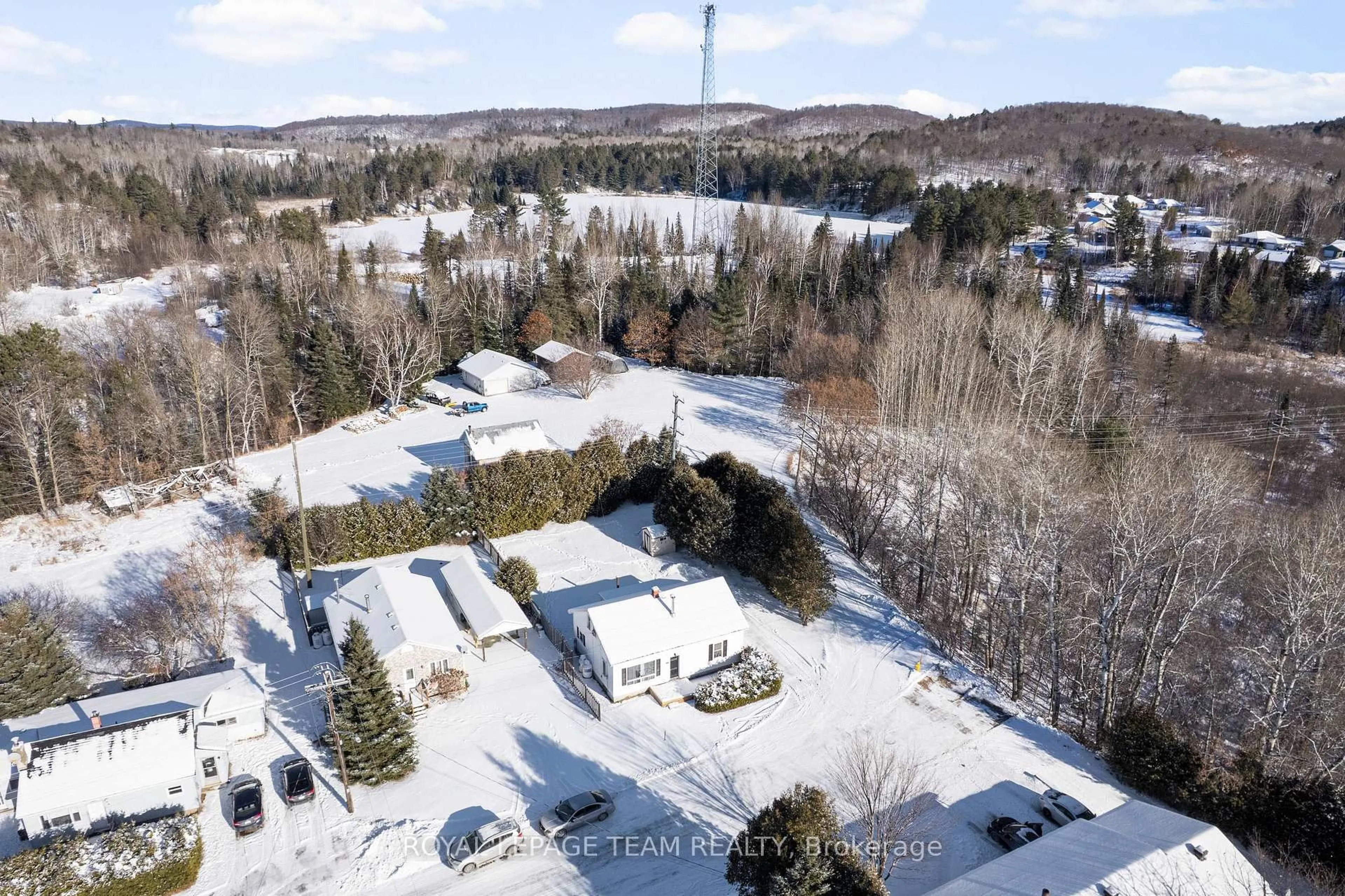 A pic from outside/outdoor area/front of a property/back of a property/a pic from drone, mountain view for 21 Philip St, Barry's Bay Ontario K0J 1B0