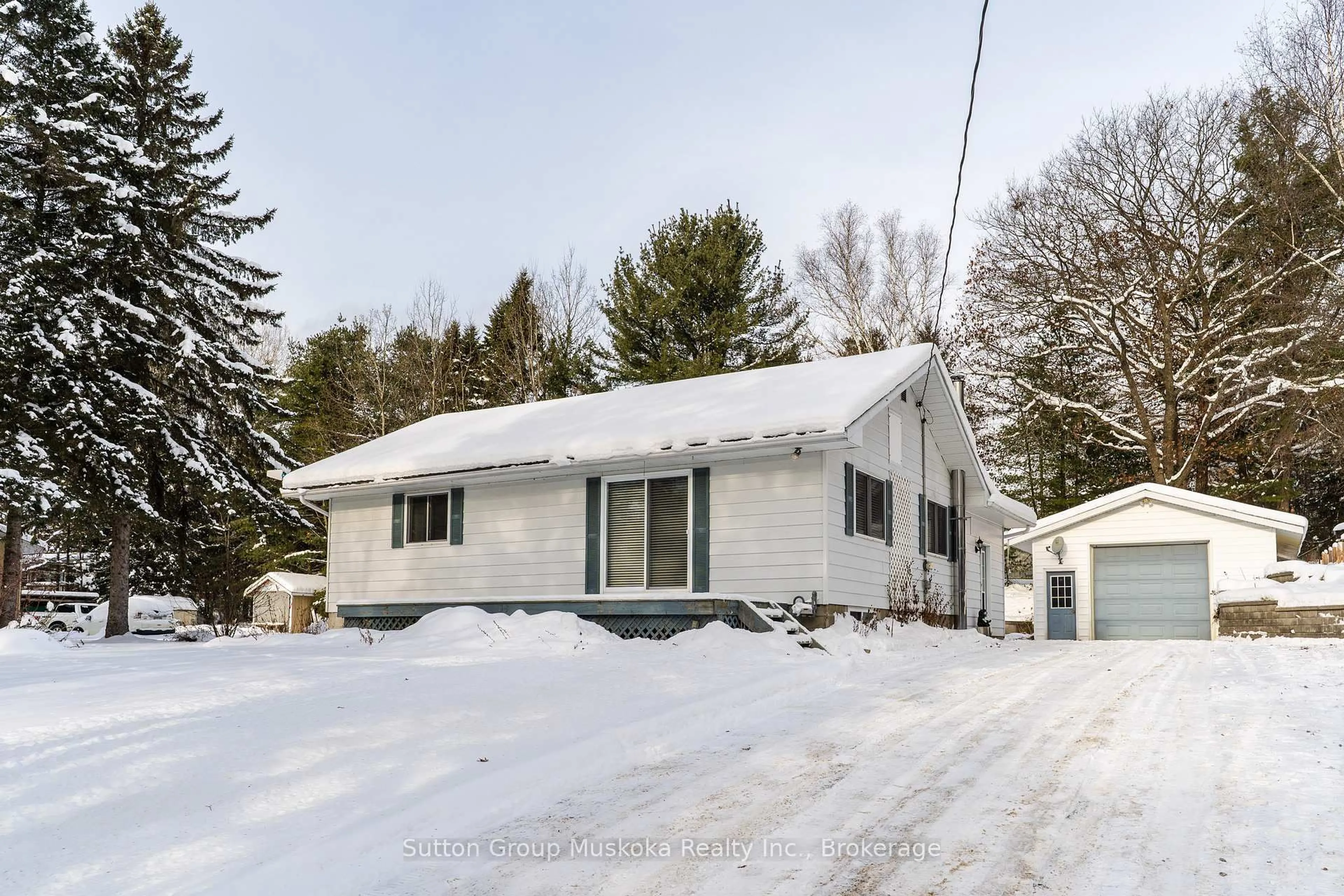 A pic from outside/outdoor area/front of a property/back of a property/a pic from drone, street for 64 Spruce Dr, Huntsville Ontario P0B 1L0