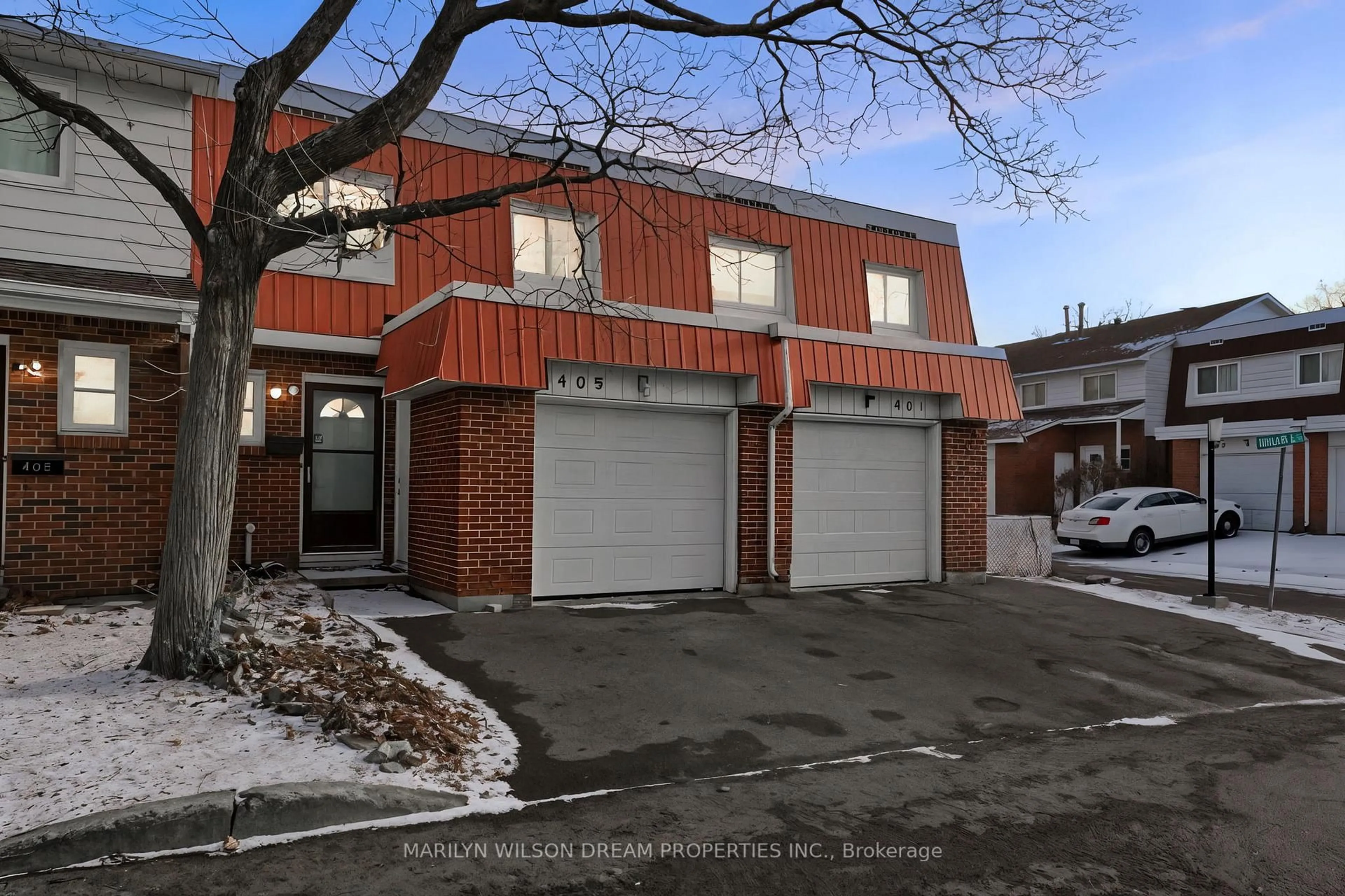 Home with brick exterior material, street for 403 Miranda Private #54, Ottawa Ontario K1K 3Y2