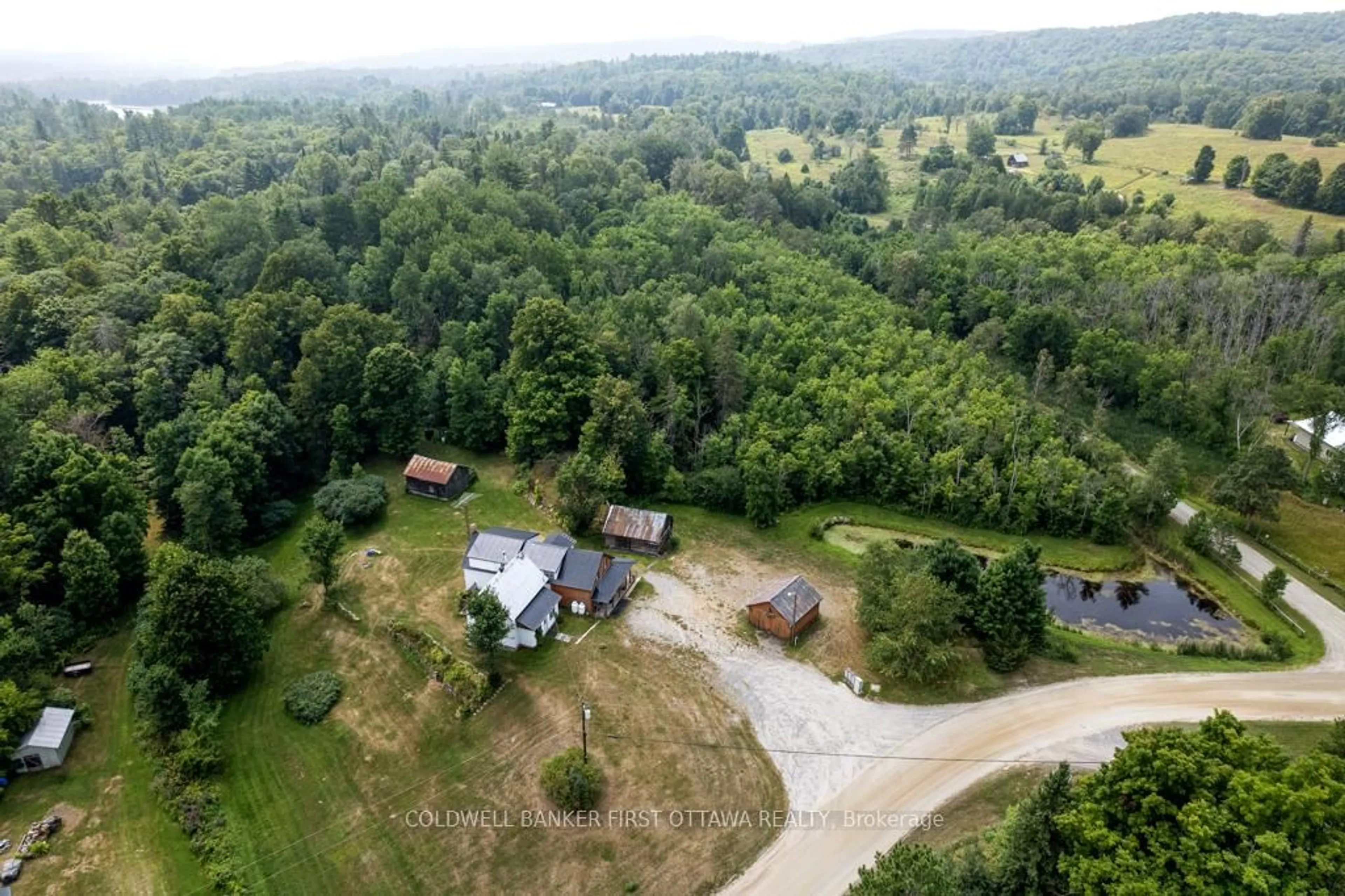 A pic from outside/outdoor area/front of a property/back of a property/a pic from drone, forest/trees view for 1373 Flower Station Rd, Lanark Ontario K0G 1K0