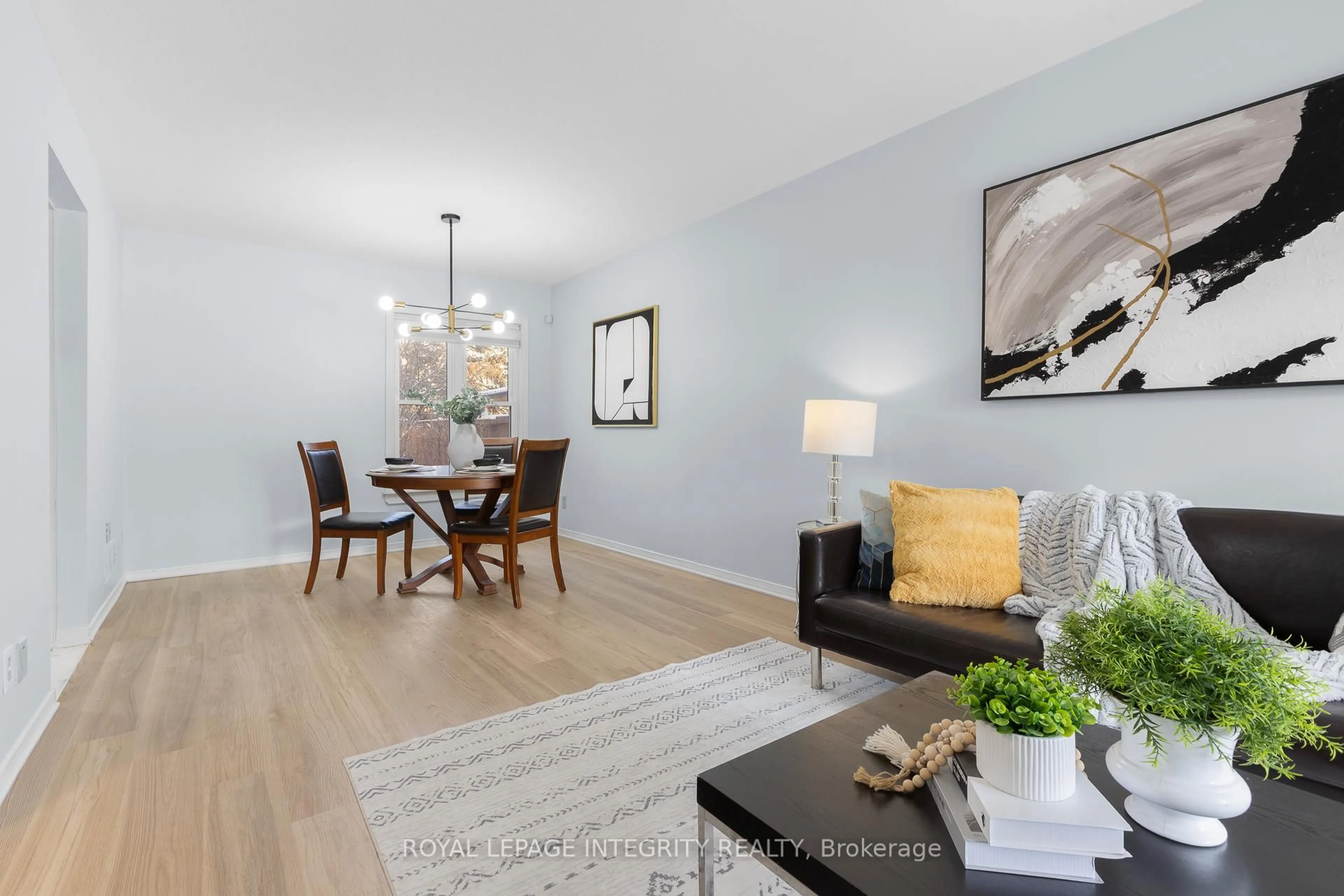 Living room with furniture, wood/laminate floor for 11 Royal Field Cres, Ottawa Ontario K2J 4G1