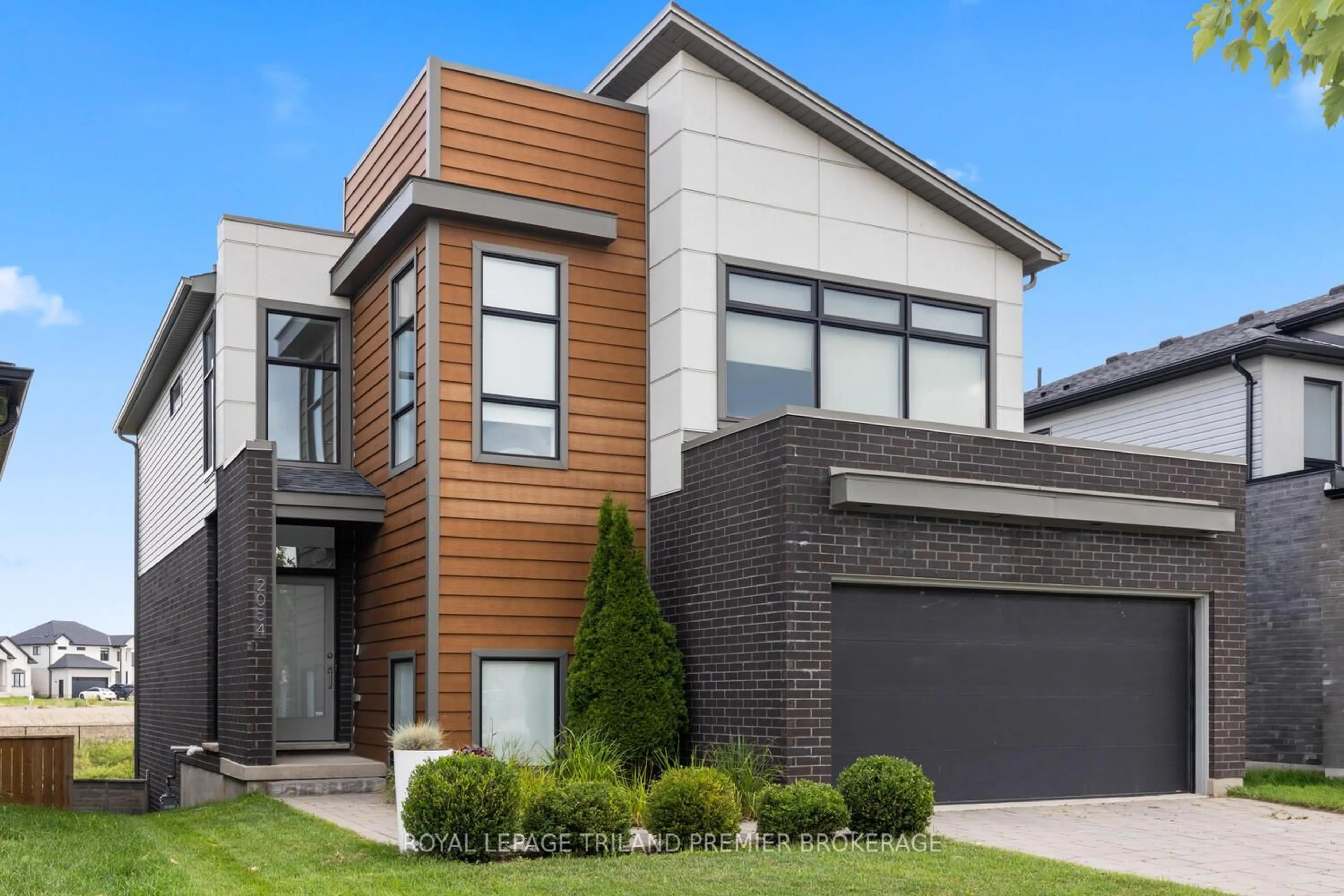 Home with brick exterior material, street for 2054 Wateroak Dr, London North Ontario N6G 5B4