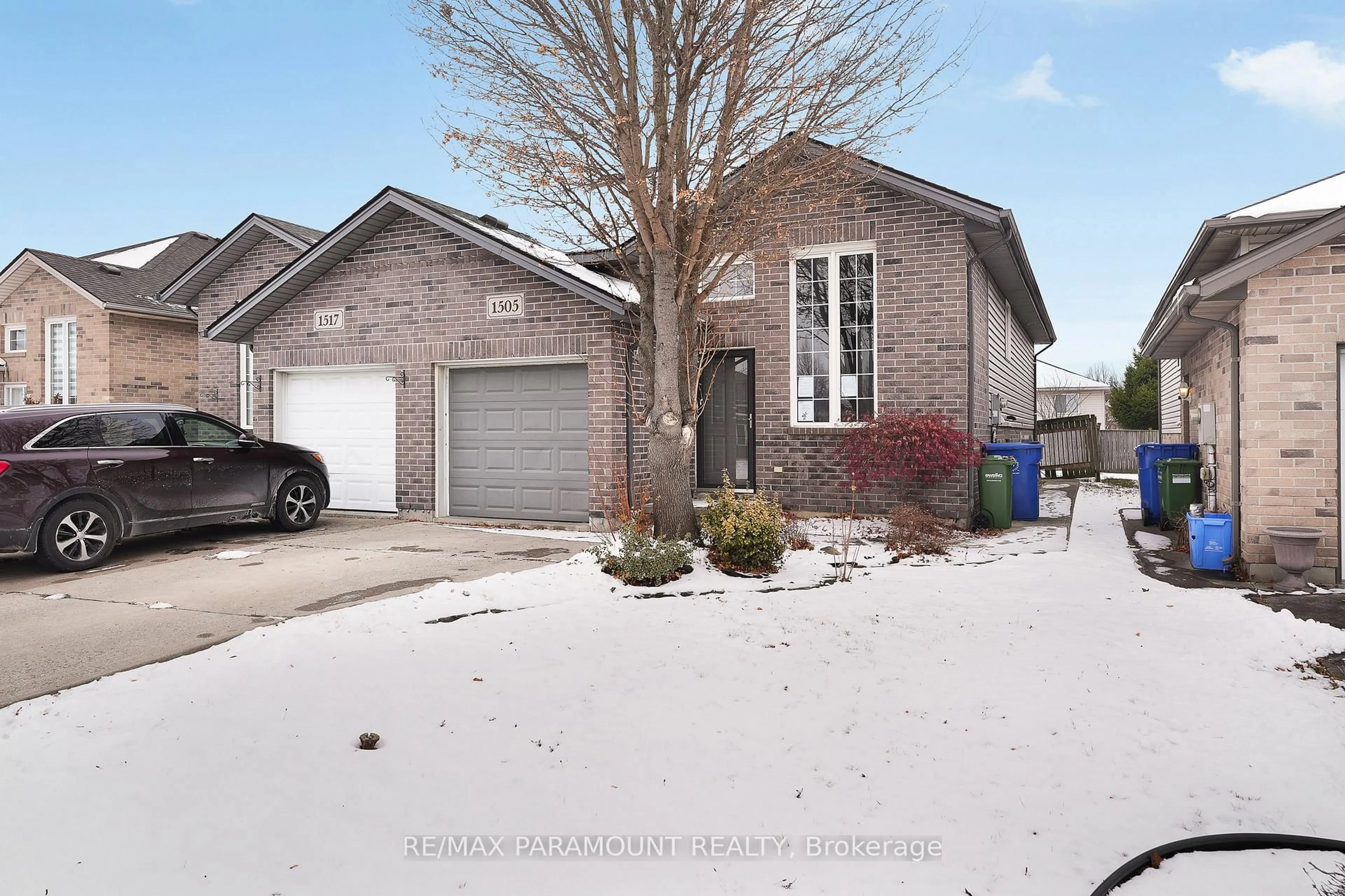 Home with brick exterior material, street for 1505 Highnoon Dr, Windsor Ontario N9G 3B6