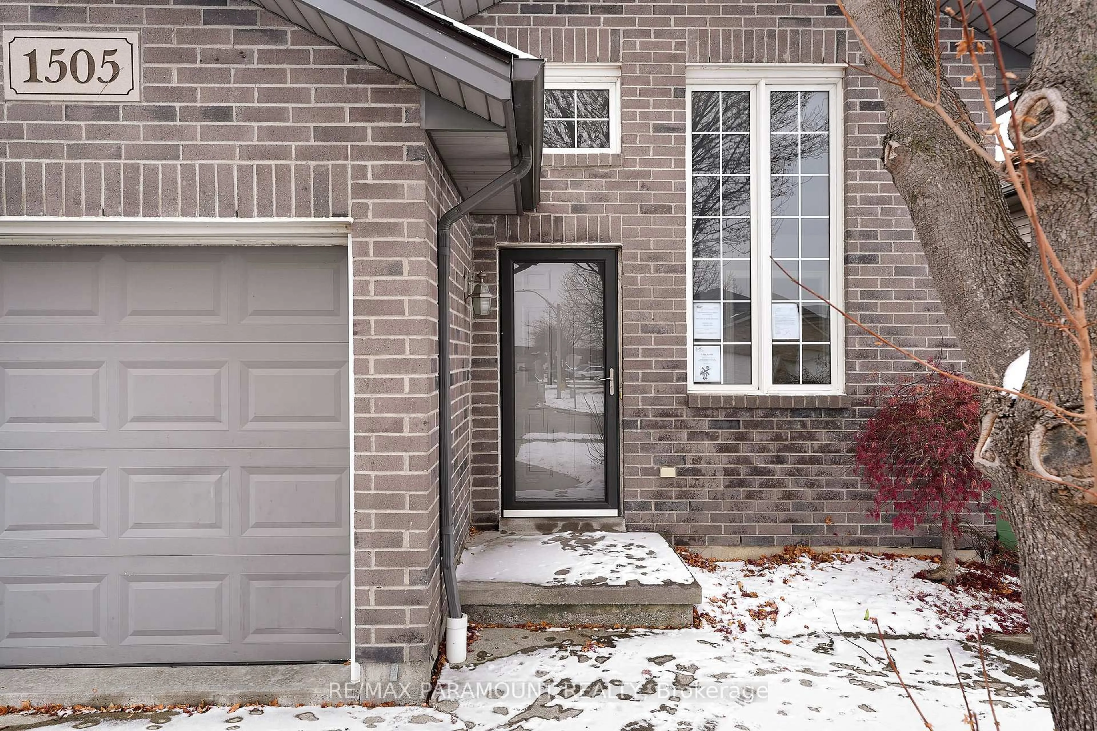 Home with brick exterior material, street for 1505 Highnoon Dr, Windsor Ontario N9G 3B6