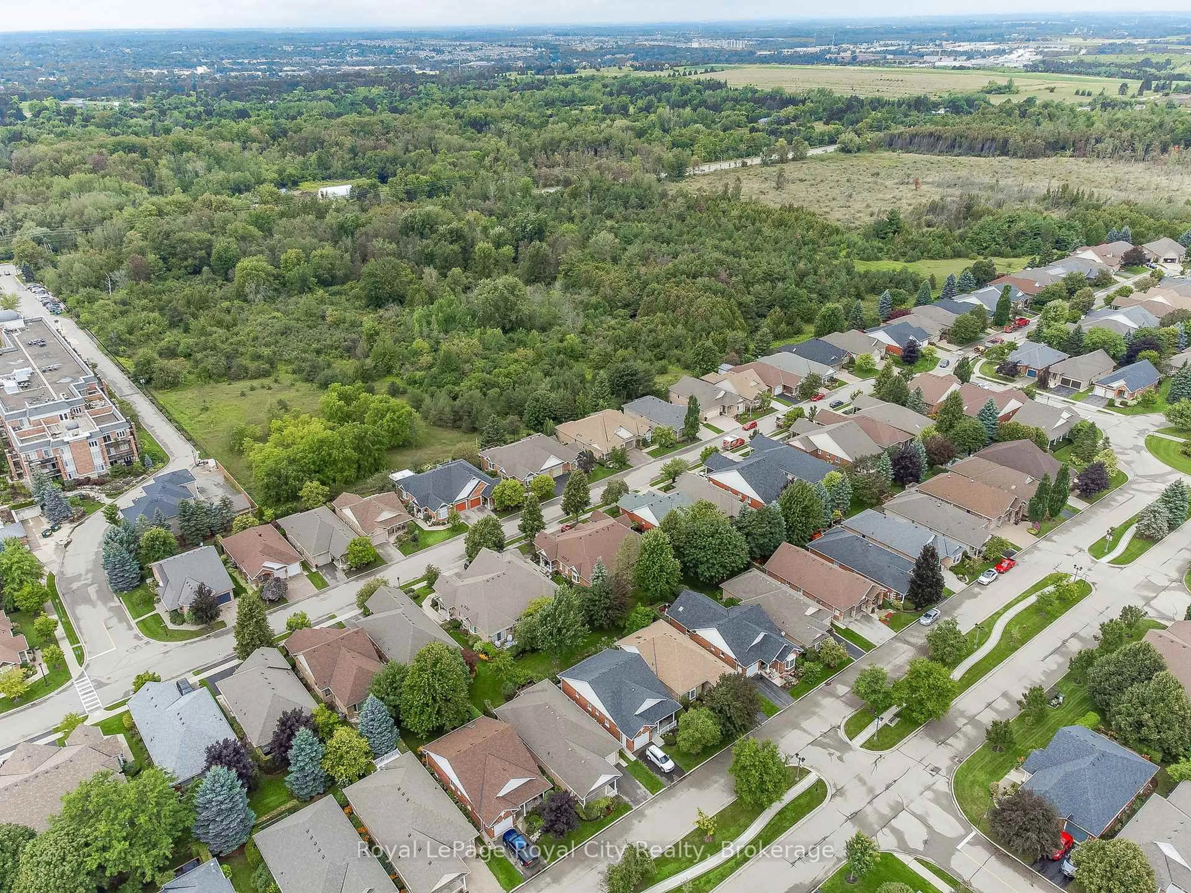 A pic from outside/outdoor area/front of a property/back of a property/a pic from drone, street for 24 Beechlawn Blvd, Guelph Ontario N1G 4X7