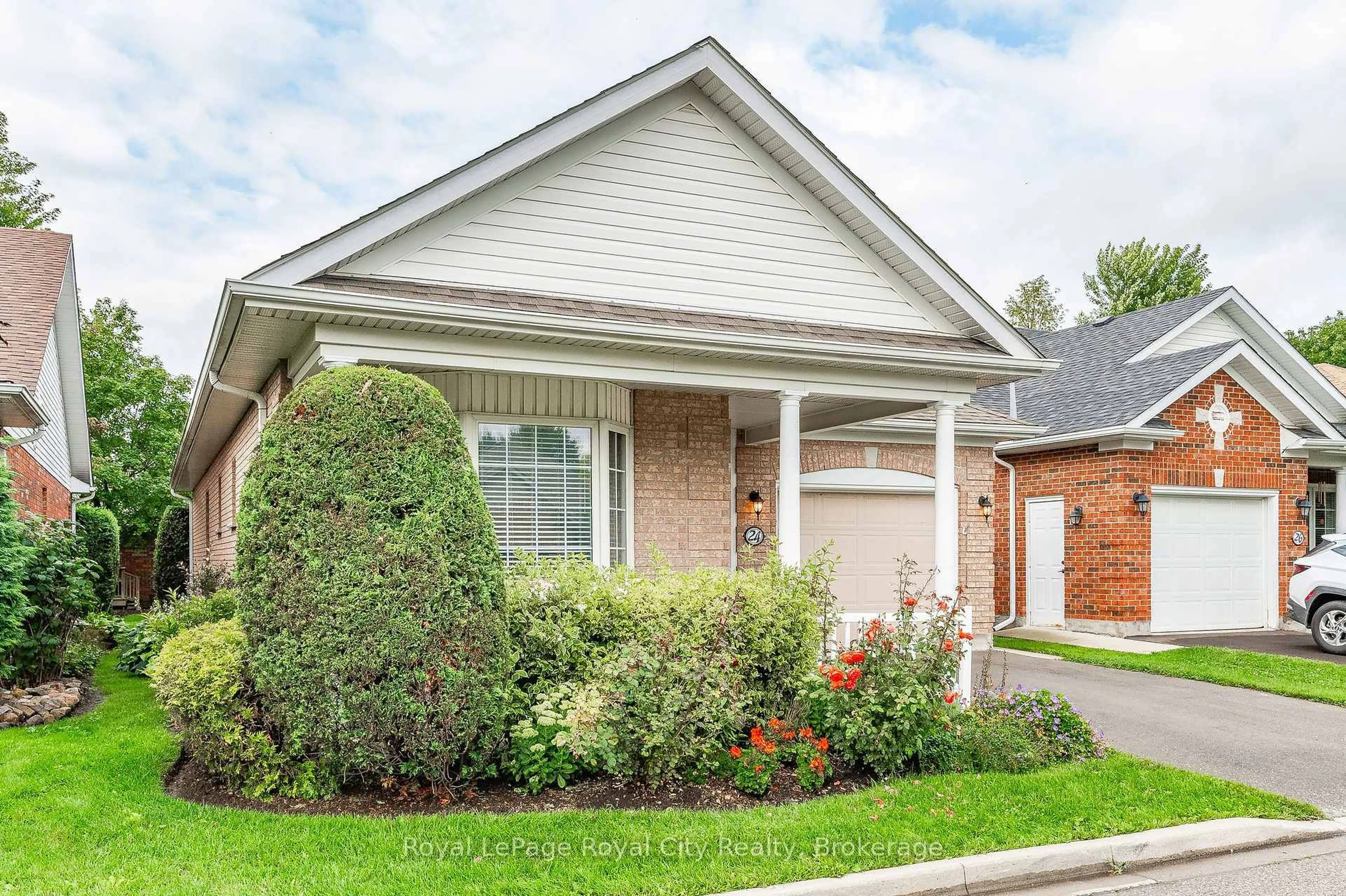 Home with brick exterior material, street for 24 Beechlawn Blvd, Guelph Ontario N1G 4X7