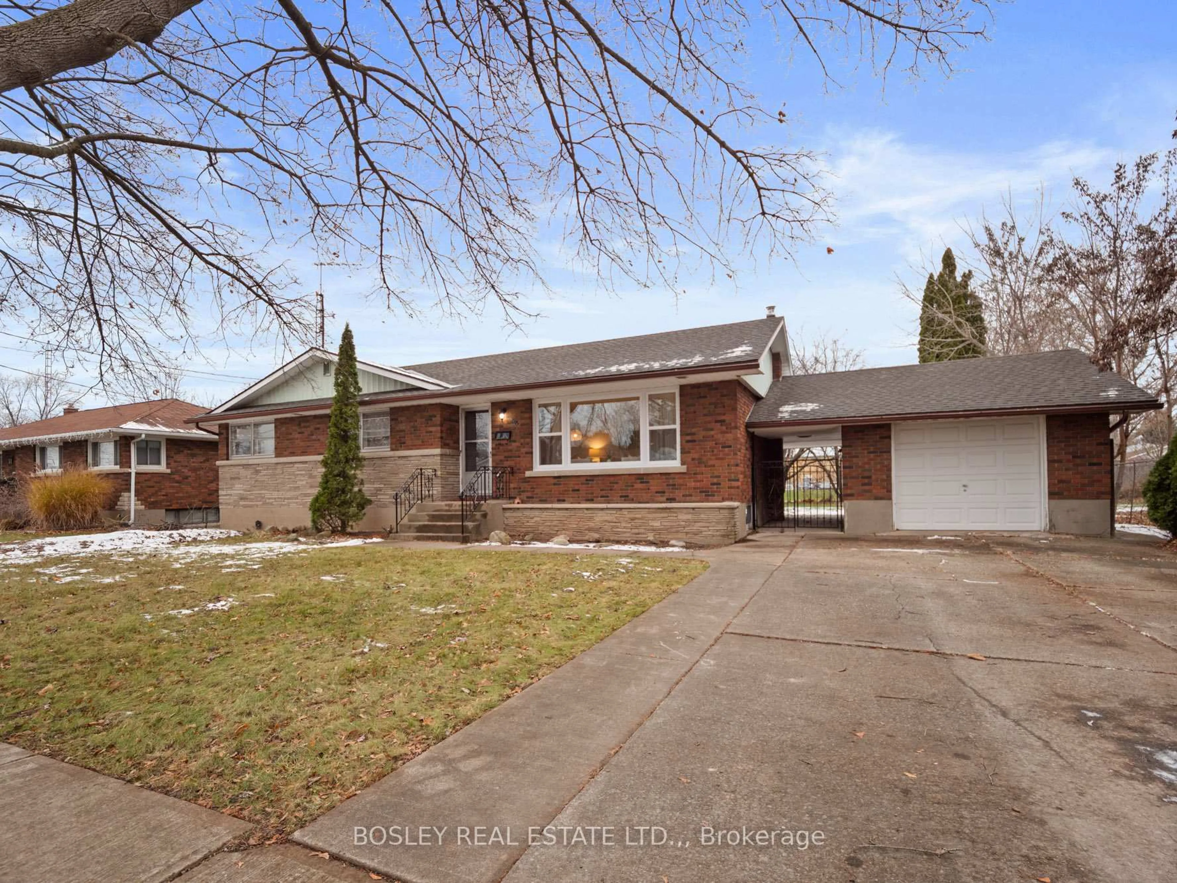 Home with brick exterior material, street for 33 Tamarack Ave, St. Catharines Ontario L3M 3C1
