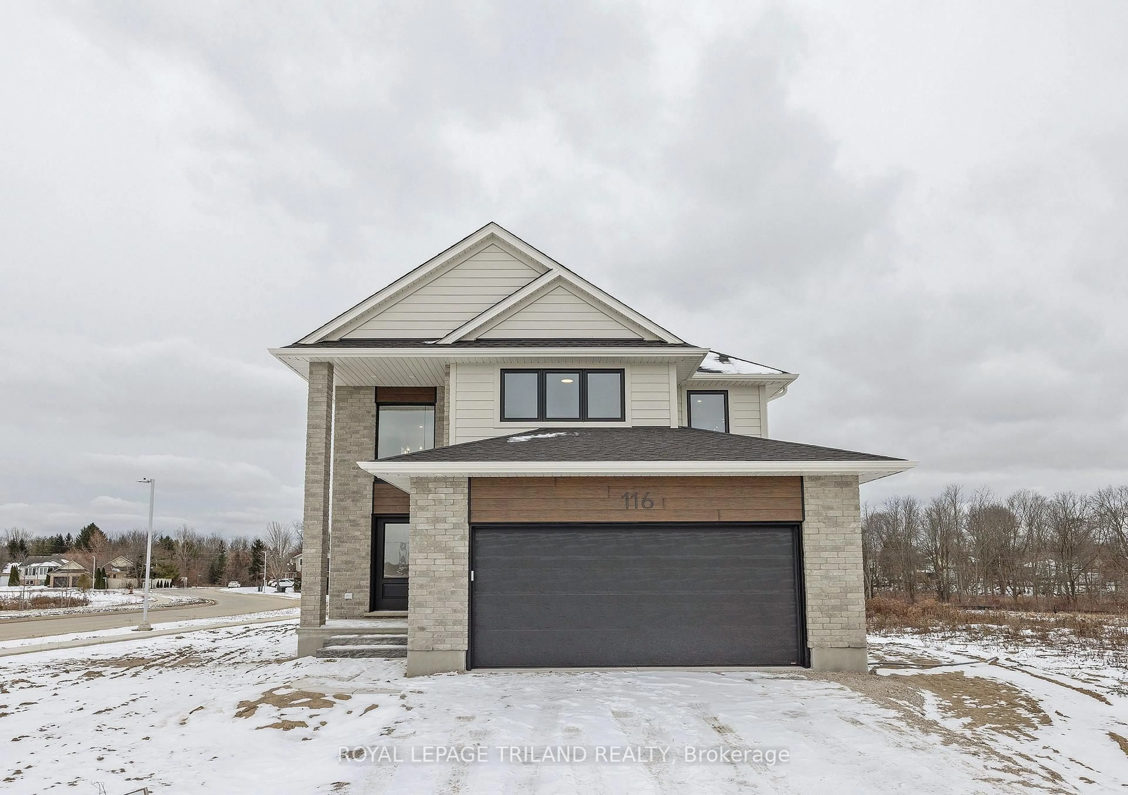 Home with brick exterior material, street for 116 ASPEN Pkwy, Aylmer Ontario N5H 3H7