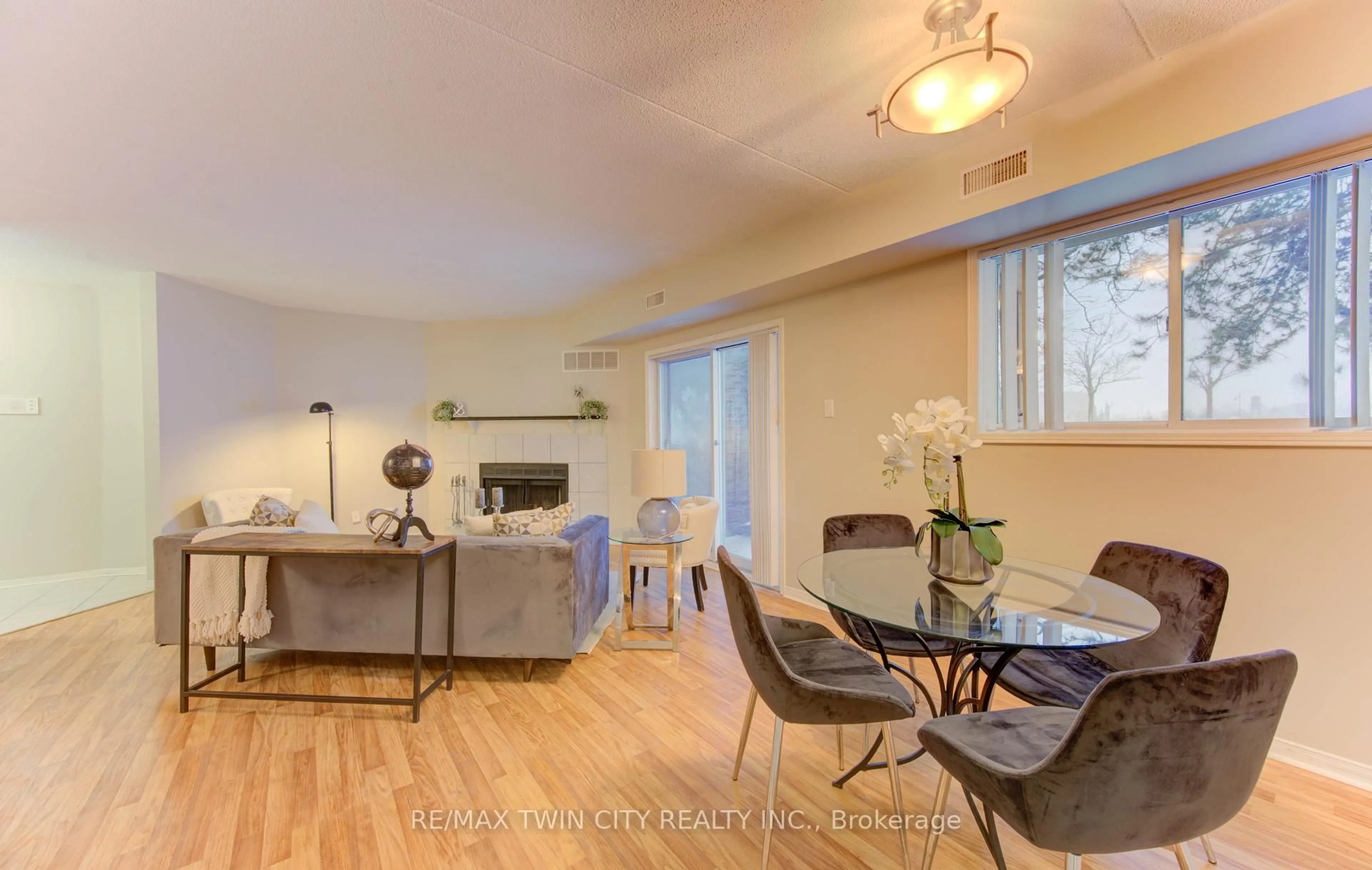 Living room with furniture, wood/laminate floor for 3085 Kingsway Dr #50, Waterloo Ontario N2C 2P2