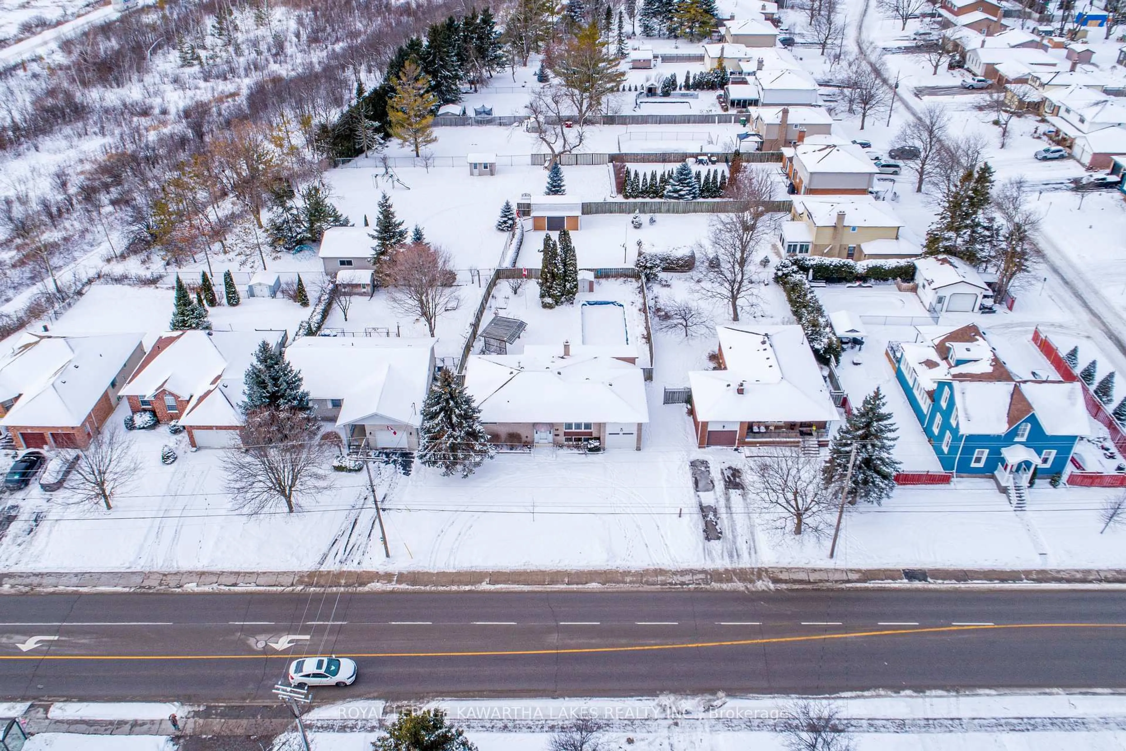 A pic from outside/outdoor area/front of a property/back of a property/a pic from drone, street for 89 Angeline St, Kawartha Lakes Ontario K9V 3L4