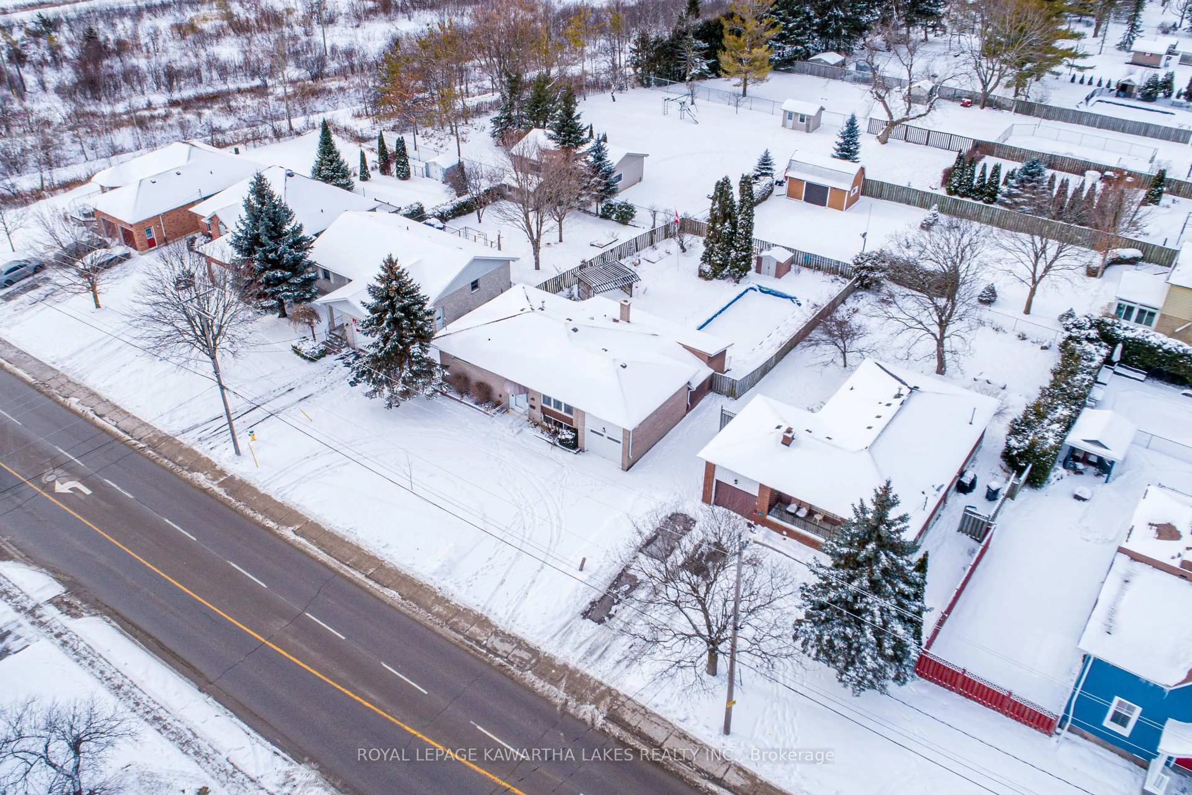 A pic from outside/outdoor area/front of a property/back of a property/a pic from drone, street for 89 Angeline St, Kawartha Lakes Ontario K9V 3L4