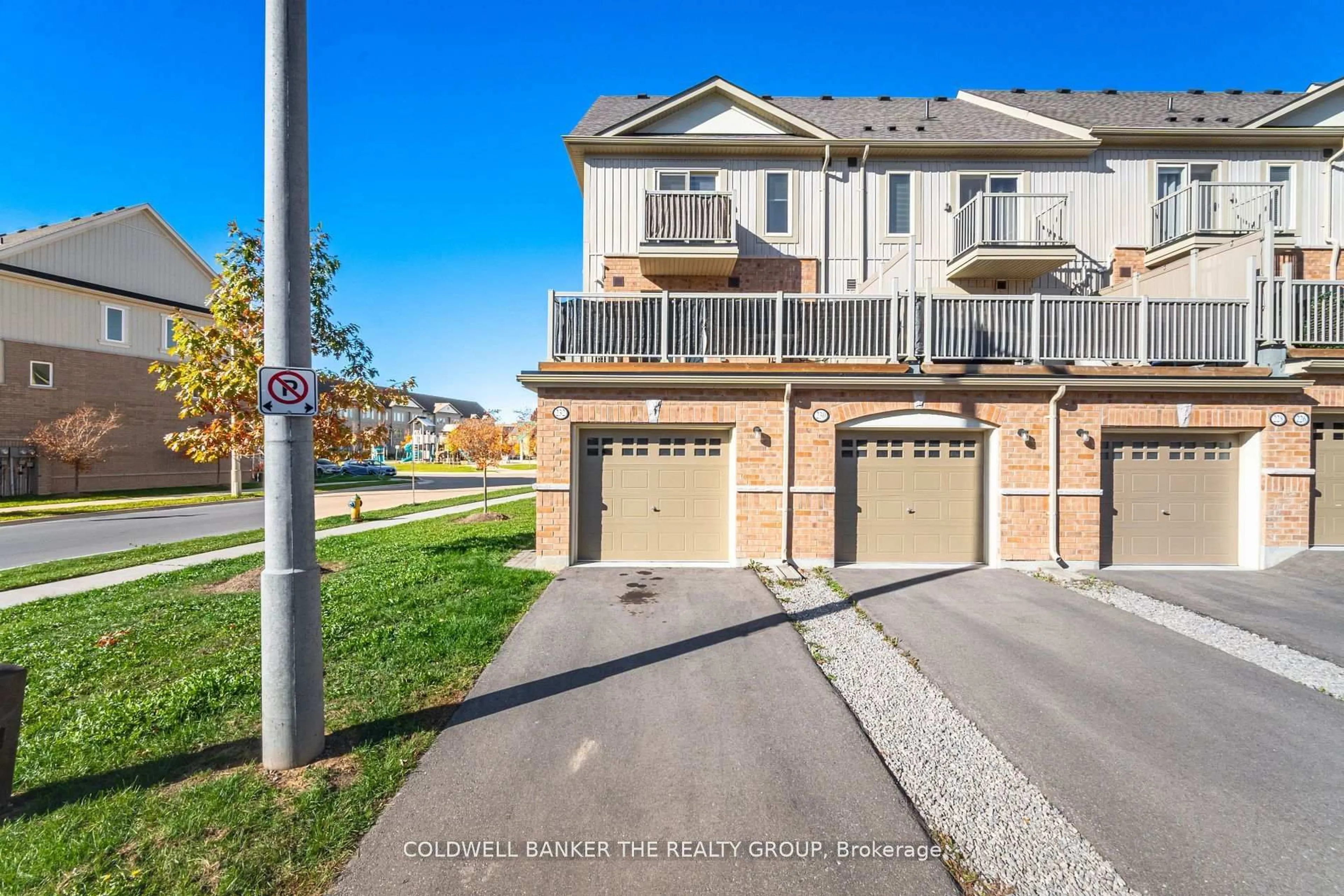 A pic from outside/outdoor area/front of a property/back of a property/a pic from drone, street for 232 law Dr #57, Guelph Ontario N1E 0P6