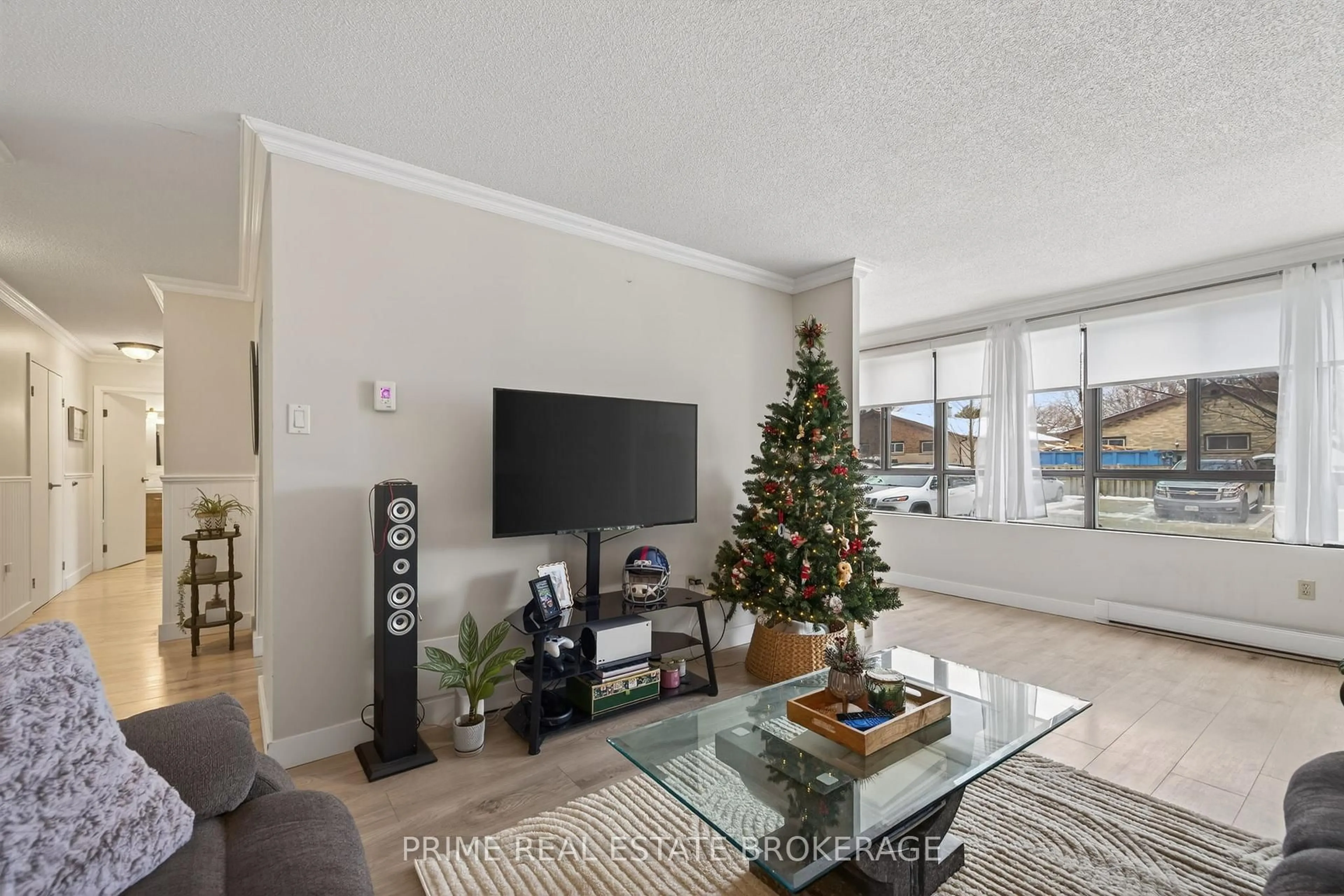 Living room with furniture, unknown for 135 Baseline Rd #102, London South Ontario N6J 4W4