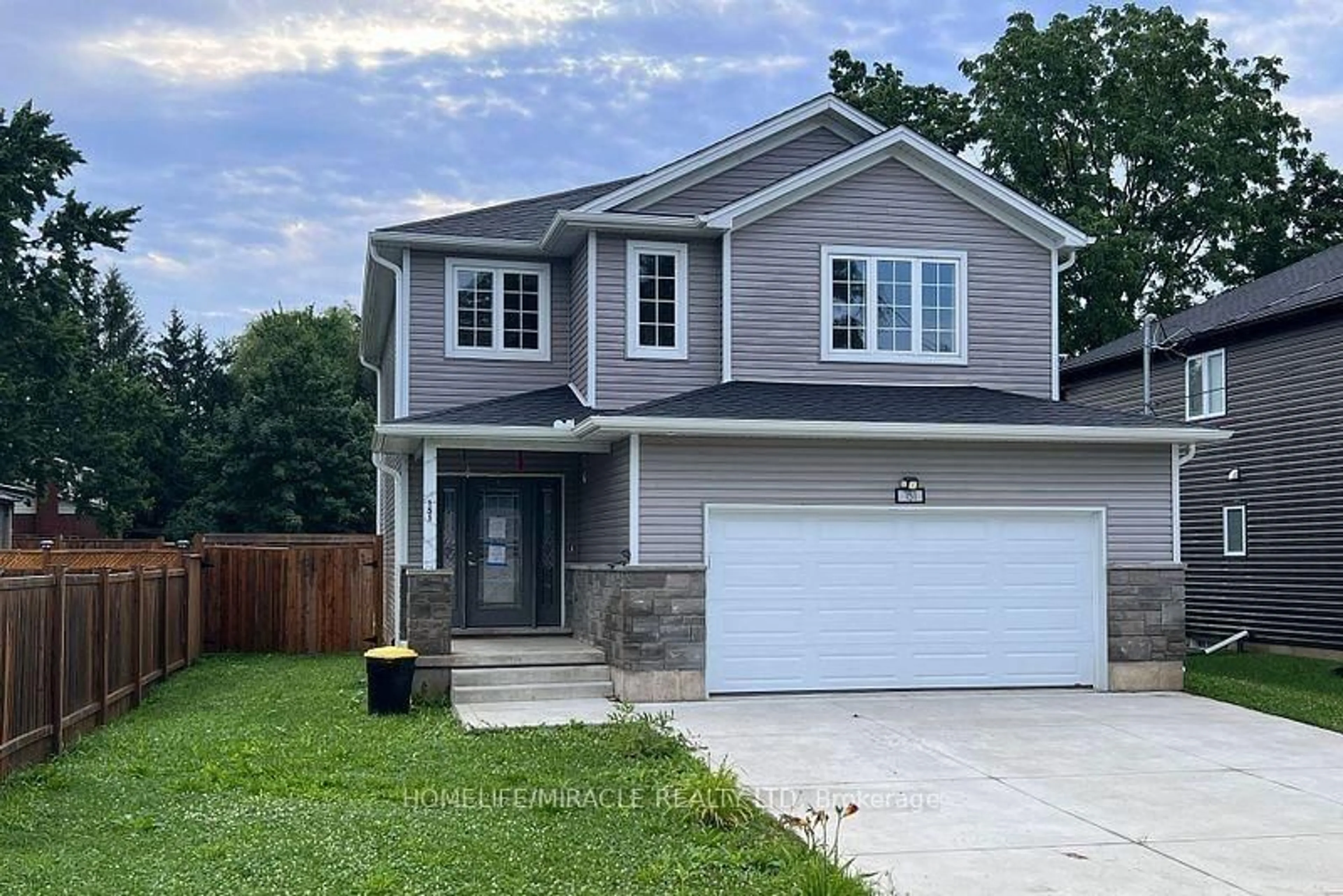 Home with vinyl exterior material, street for 151 Agnes St, Thames Centre Ontario N0M 2P0