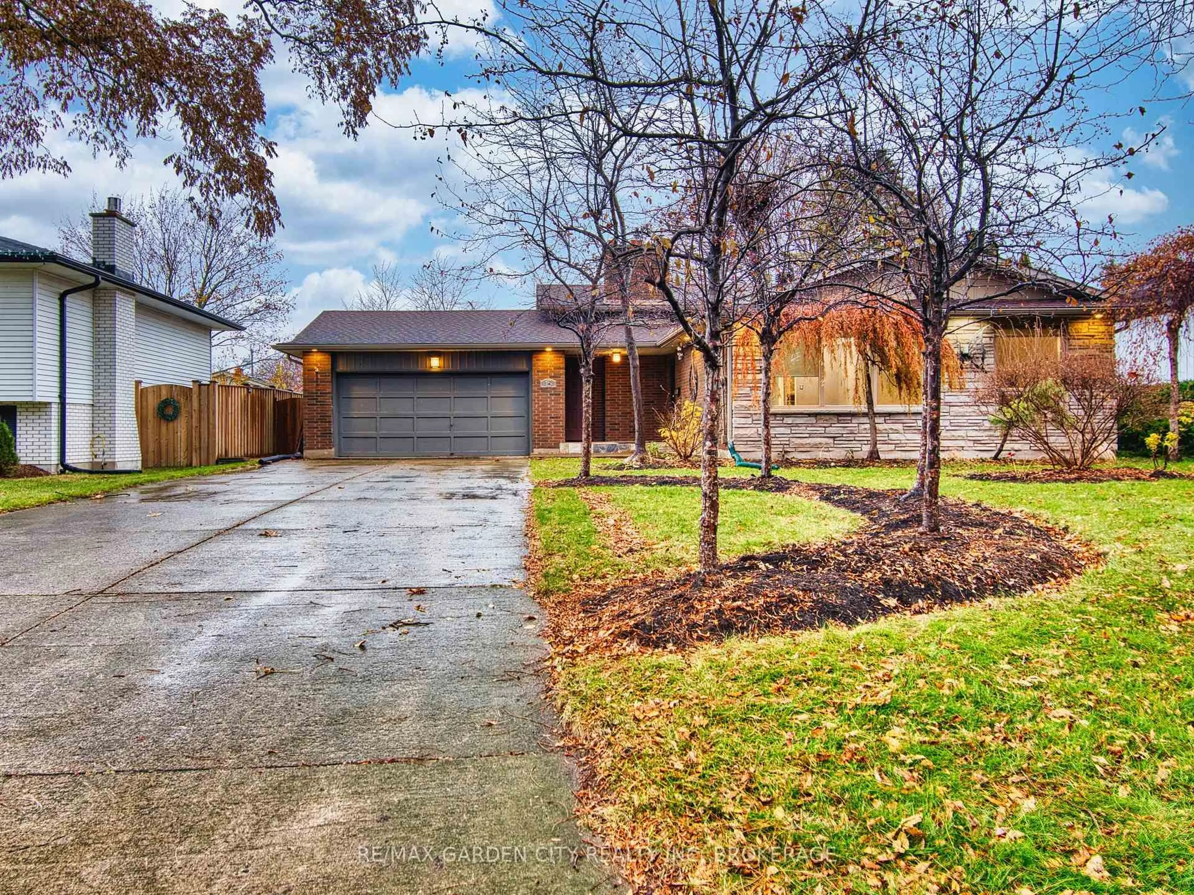 Home with brick exterior material, street for 15 Black Friars Rd, St. Catharines Ontario L2N 2M8