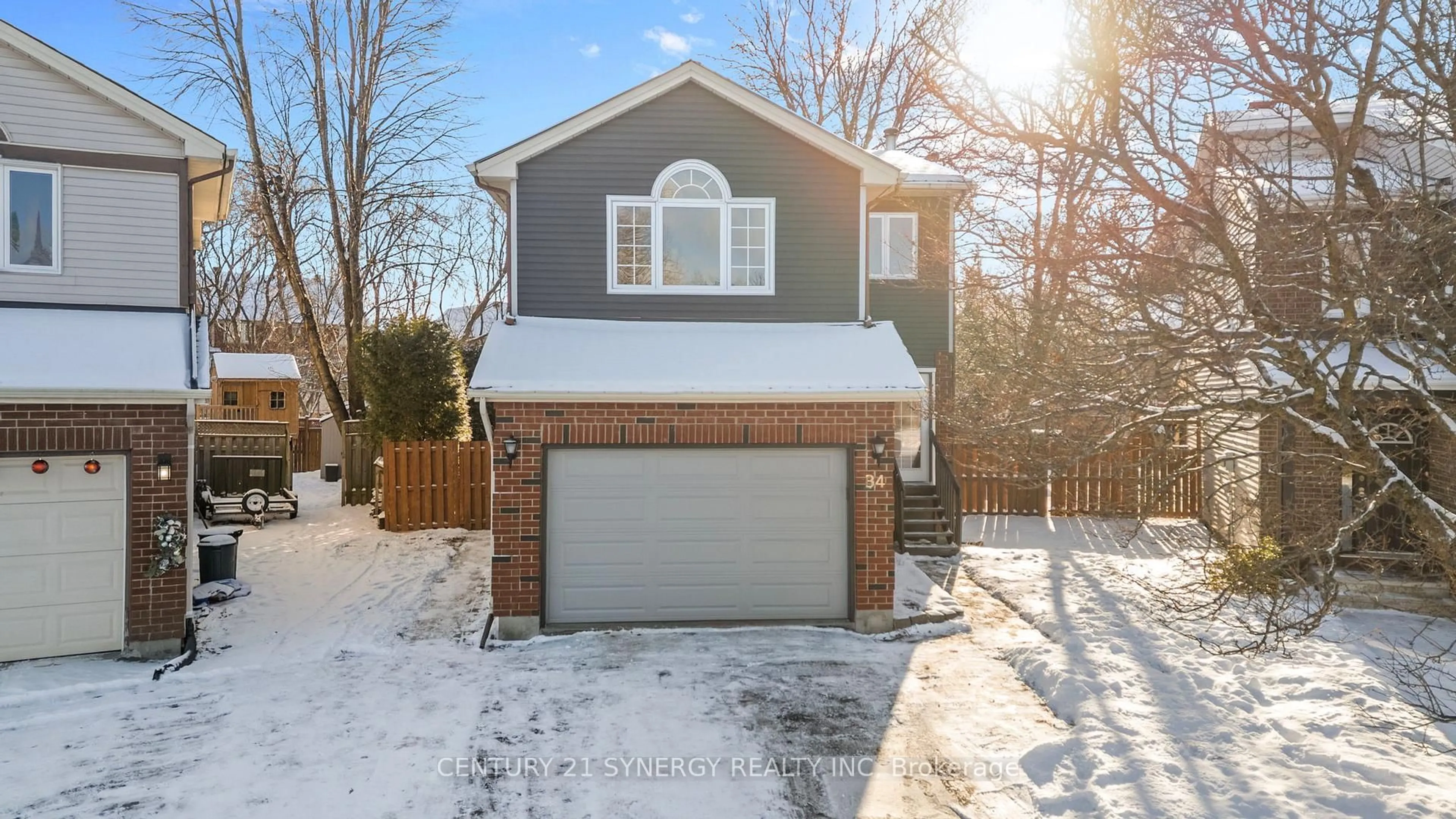 Home with brick exterior material, street for 34 Rosegarden Cres, Ottawa Ontario K1T 3A9