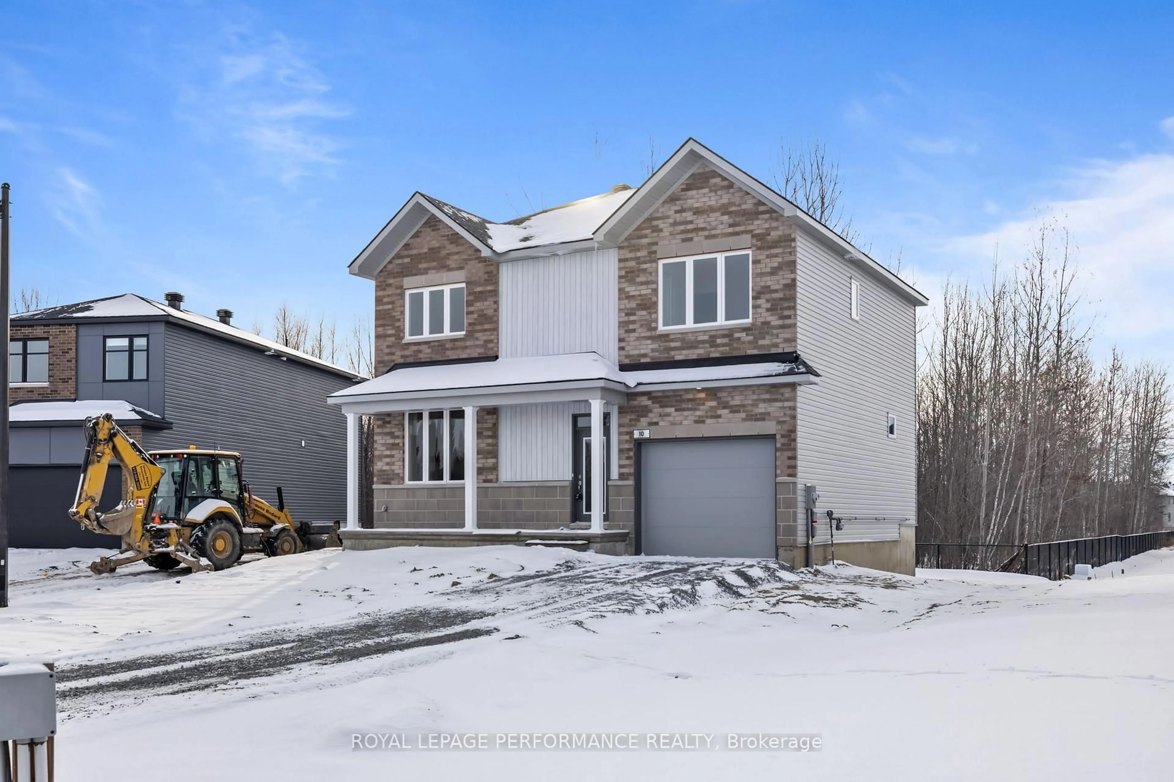 A pic from outside/outdoor area/front of a property/back of a property/a pic from drone, street for 10 Academie St, Russell Ontario K0A 1W0