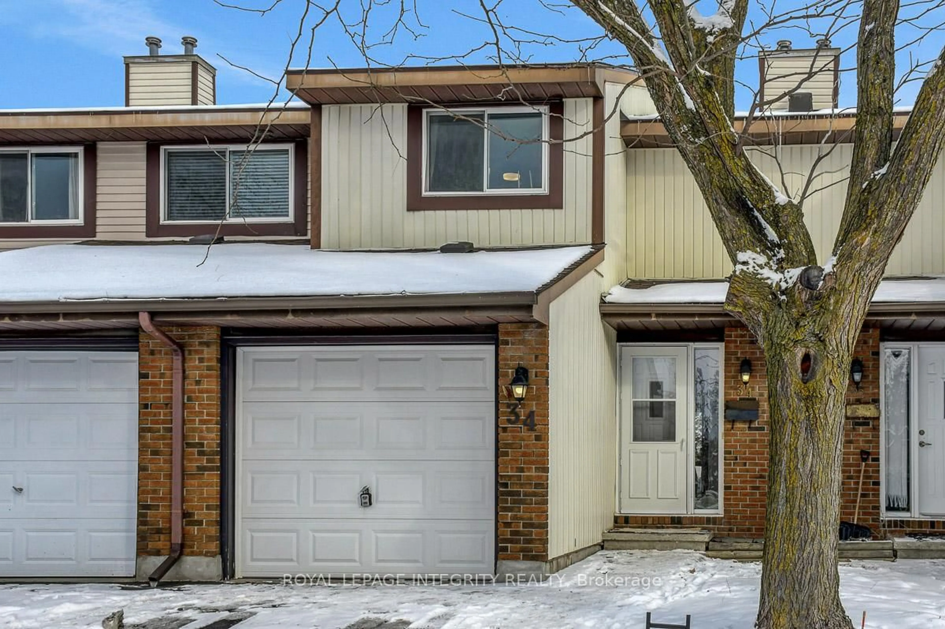 Home with vinyl exterior material, street for 34 Stokes Cres, Ottawa Ontario K2L 2Z4