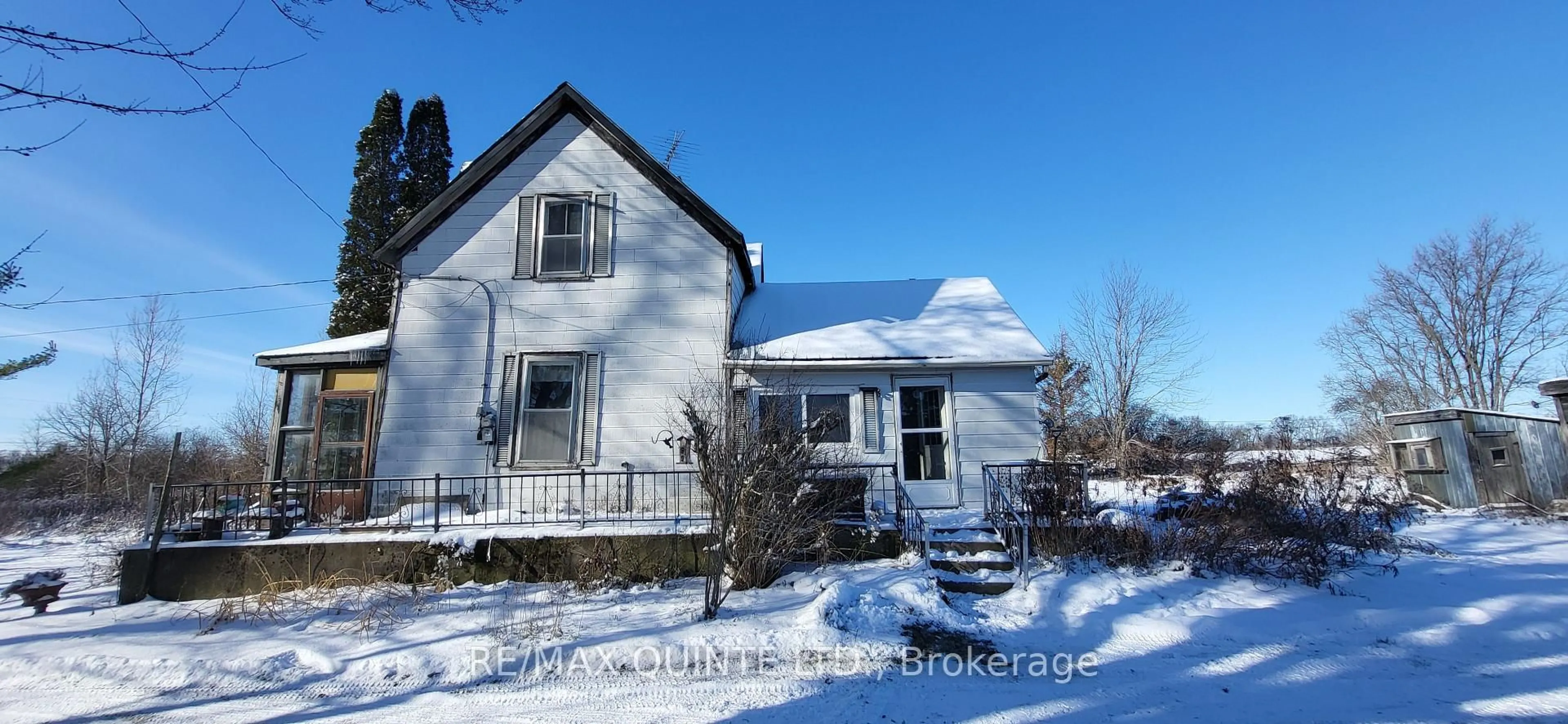 A pic from outside/outdoor area/front of a property/back of a property/a pic from drone, street for 1856 County Road 1 Rd, Prince Edward County Ontario K0K 1G0