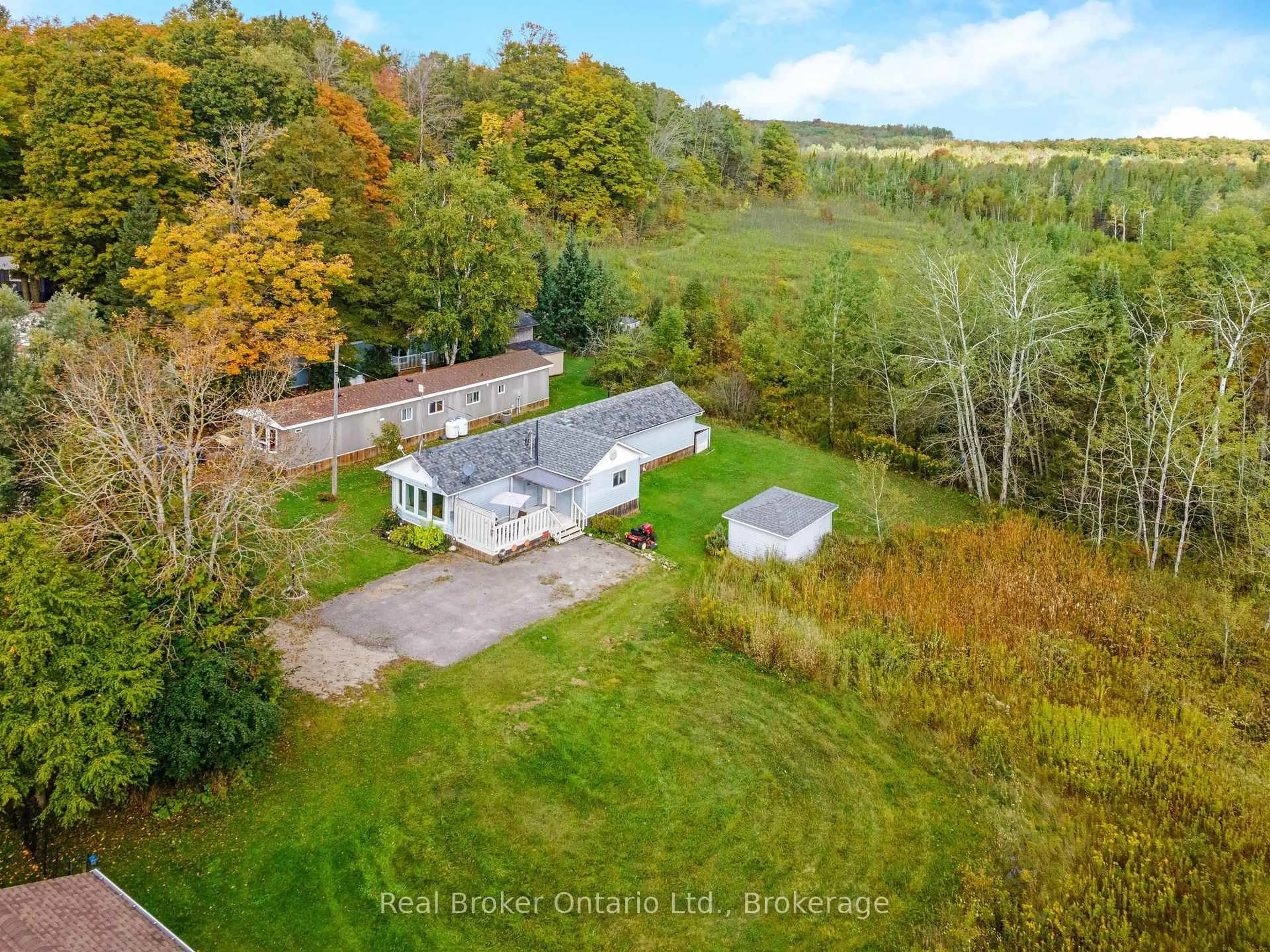 A pic from outside/outdoor area/front of a property/back of a property/a pic from drone, unknown for 026585 89 Highway #31, Southgate Ontario N0C 1B0