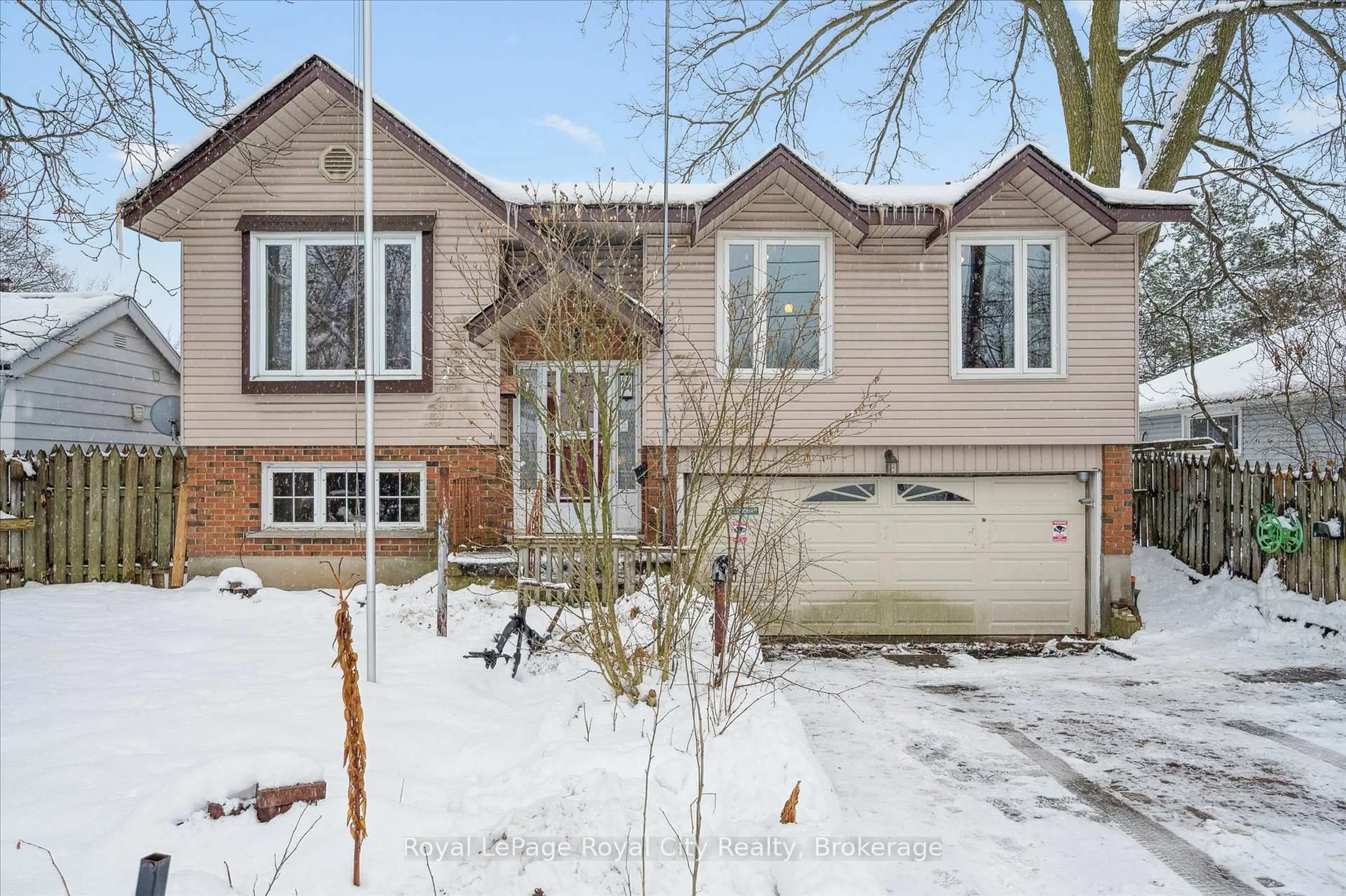 Home with brick exterior material, street for 224 DELHI St, Guelph Ontario N1E 4K2