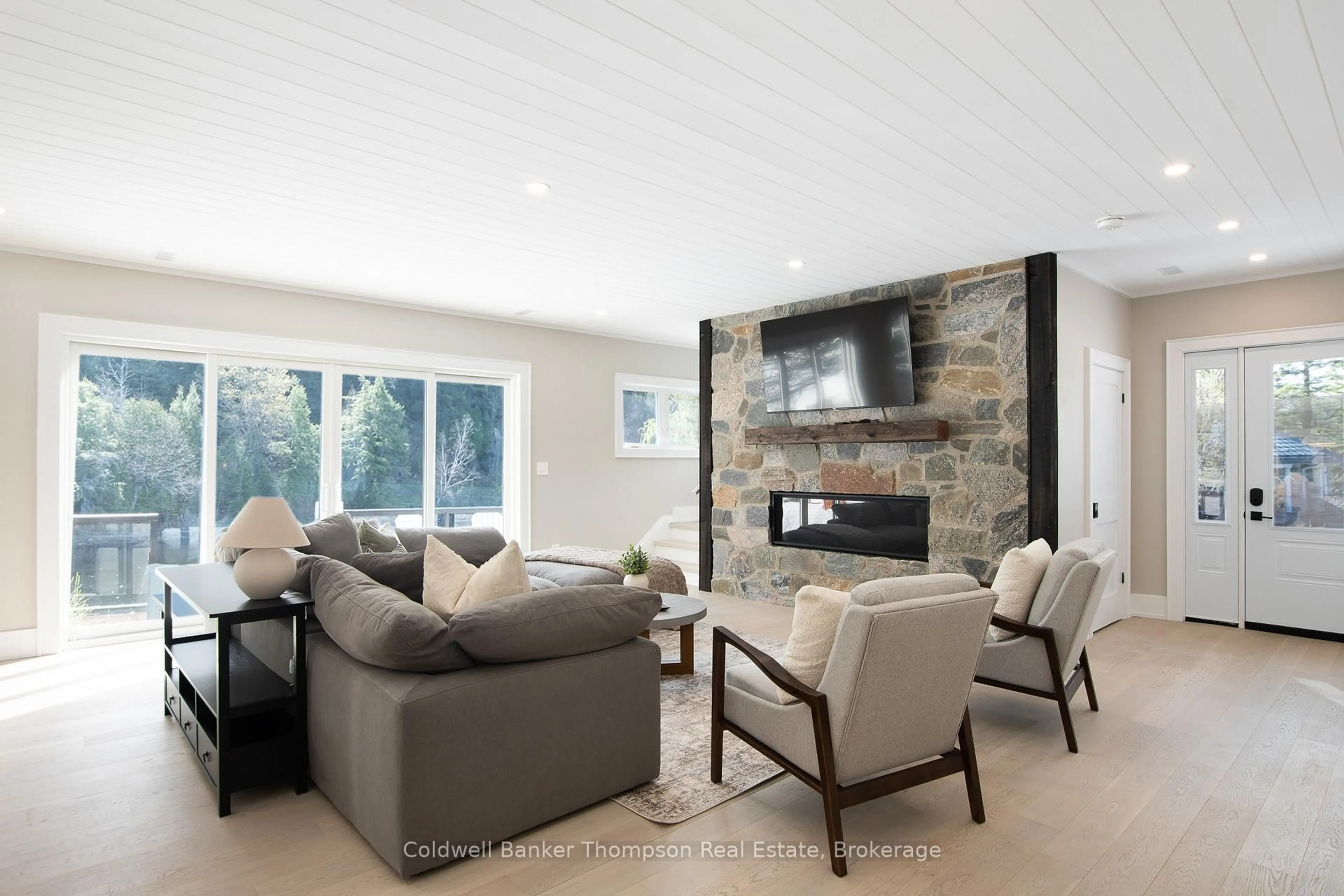 Living room with furniture, unknown for 32 Church St, Huntsville Ontario P1H 1G8