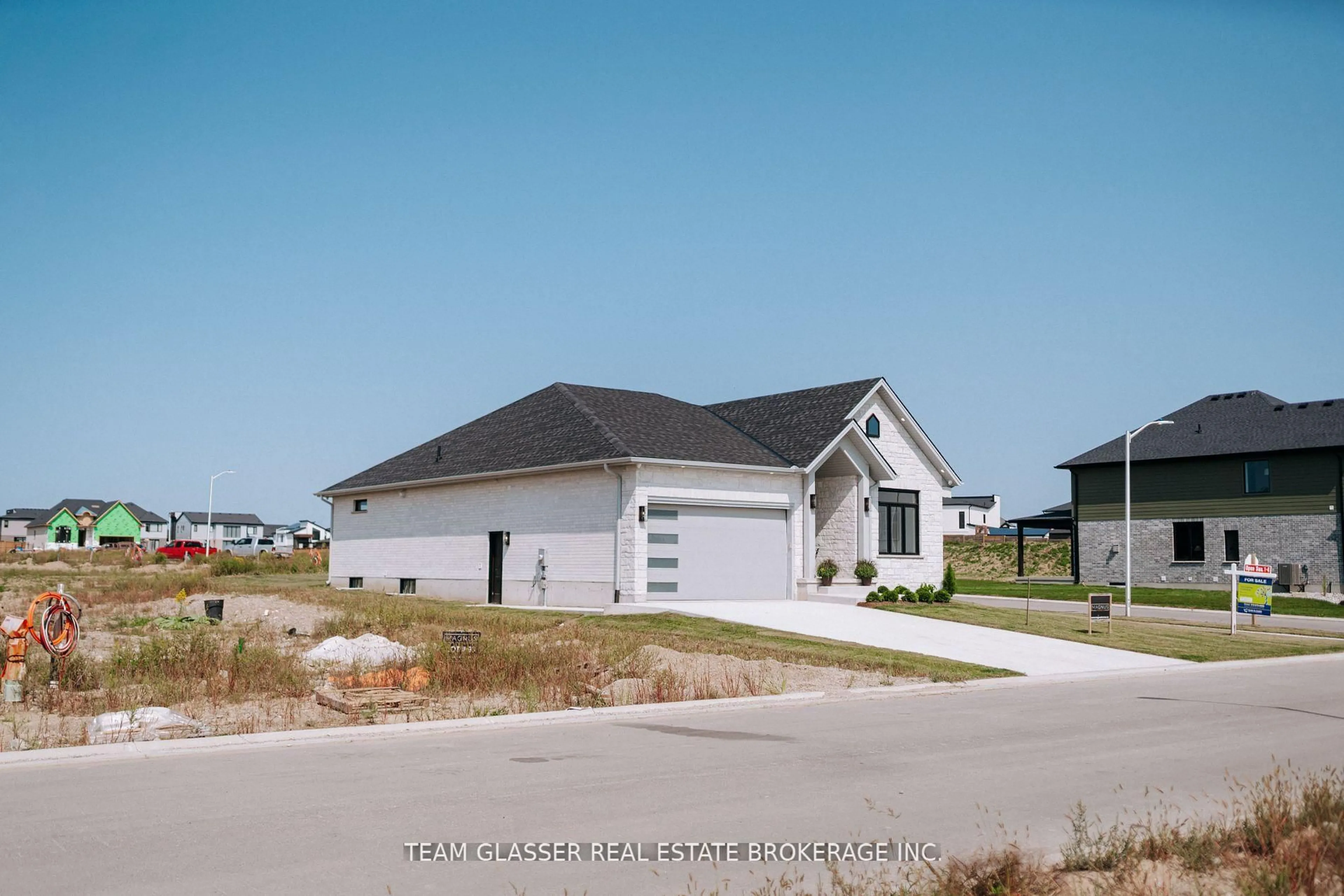 Home with vinyl exterior material, street for 73 (Lot 18) Dearing Dr, South Huron Ontario N0M 1T0