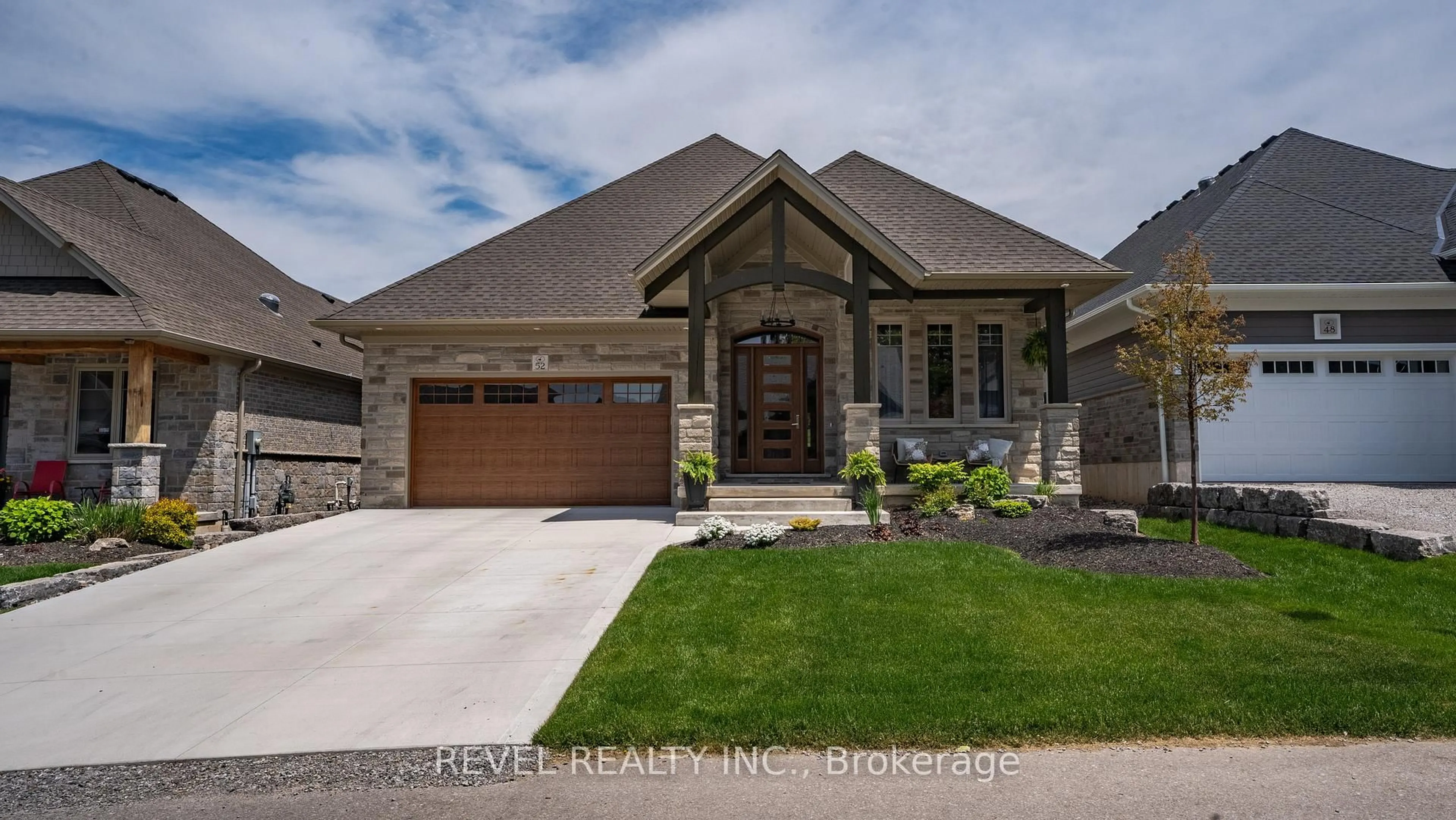 Home with brick exterior material, street for 52 Beechnut Lane, Norfolk Ontario N0A 1N7