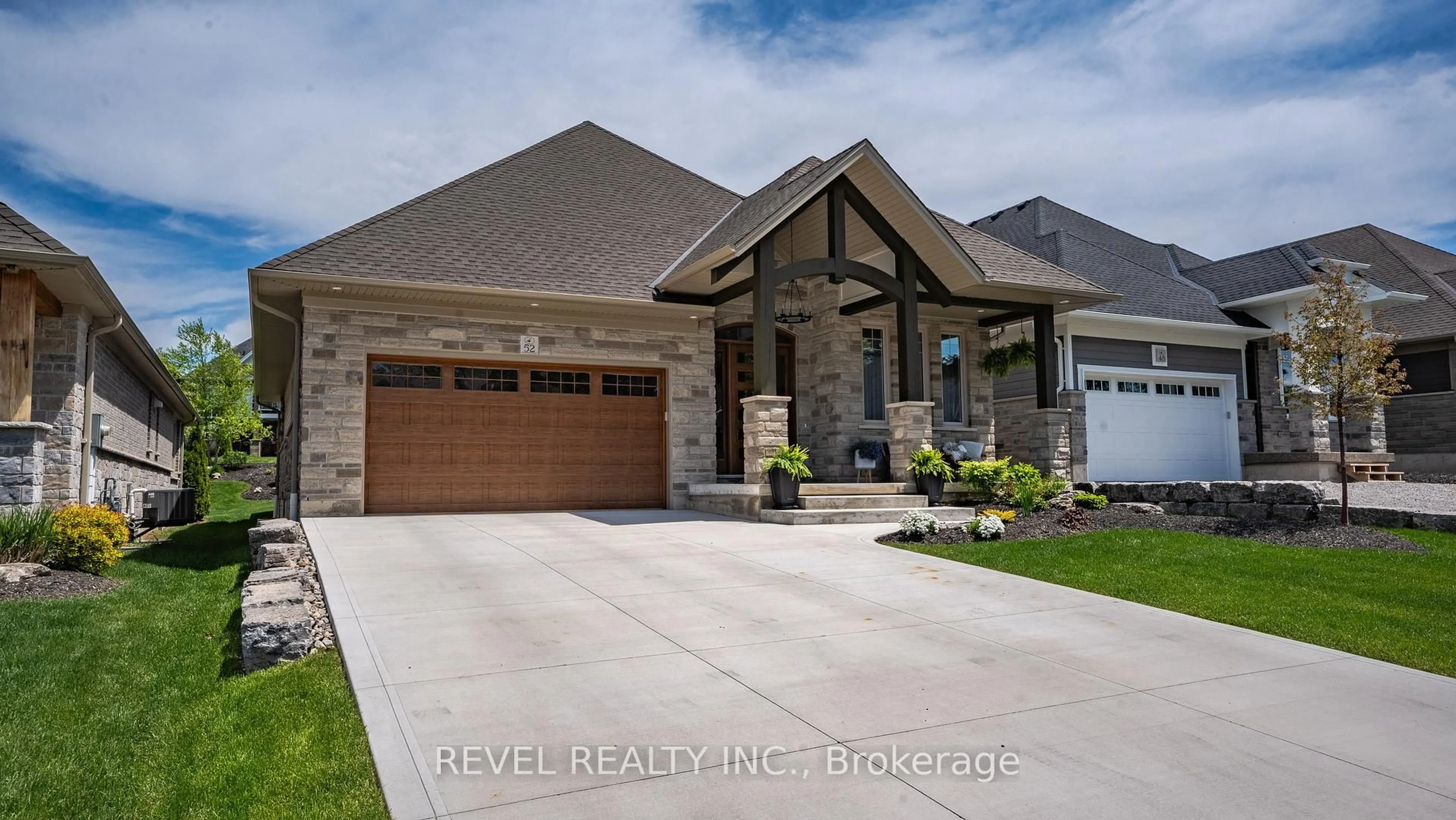 Home with brick exterior material, street for 52 Beechnut Lane, Norfolk Ontario N0A 1N7