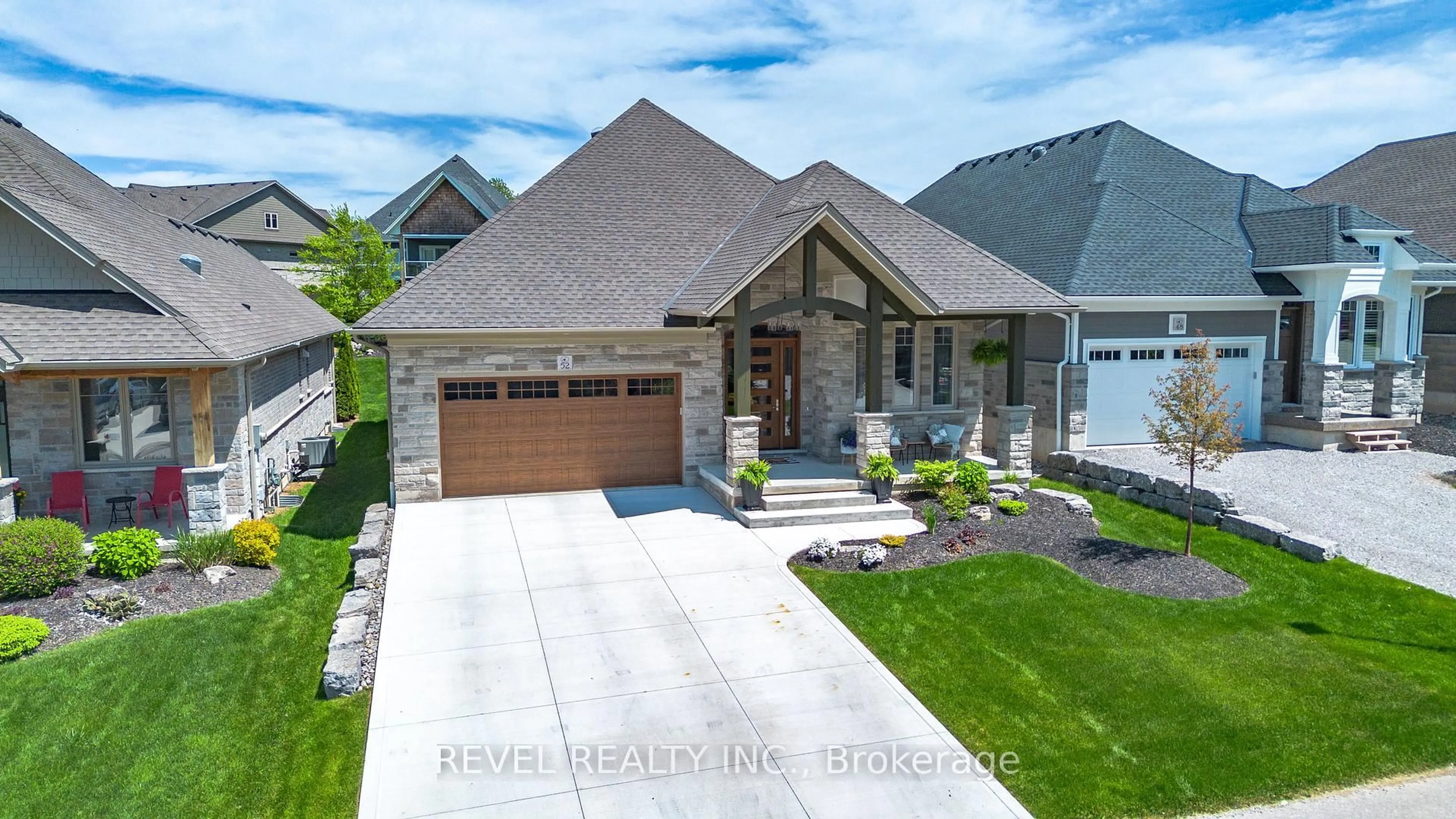 Home with brick exterior material, street for 52 Beechnut Lane, Norfolk Ontario N0A 1N7