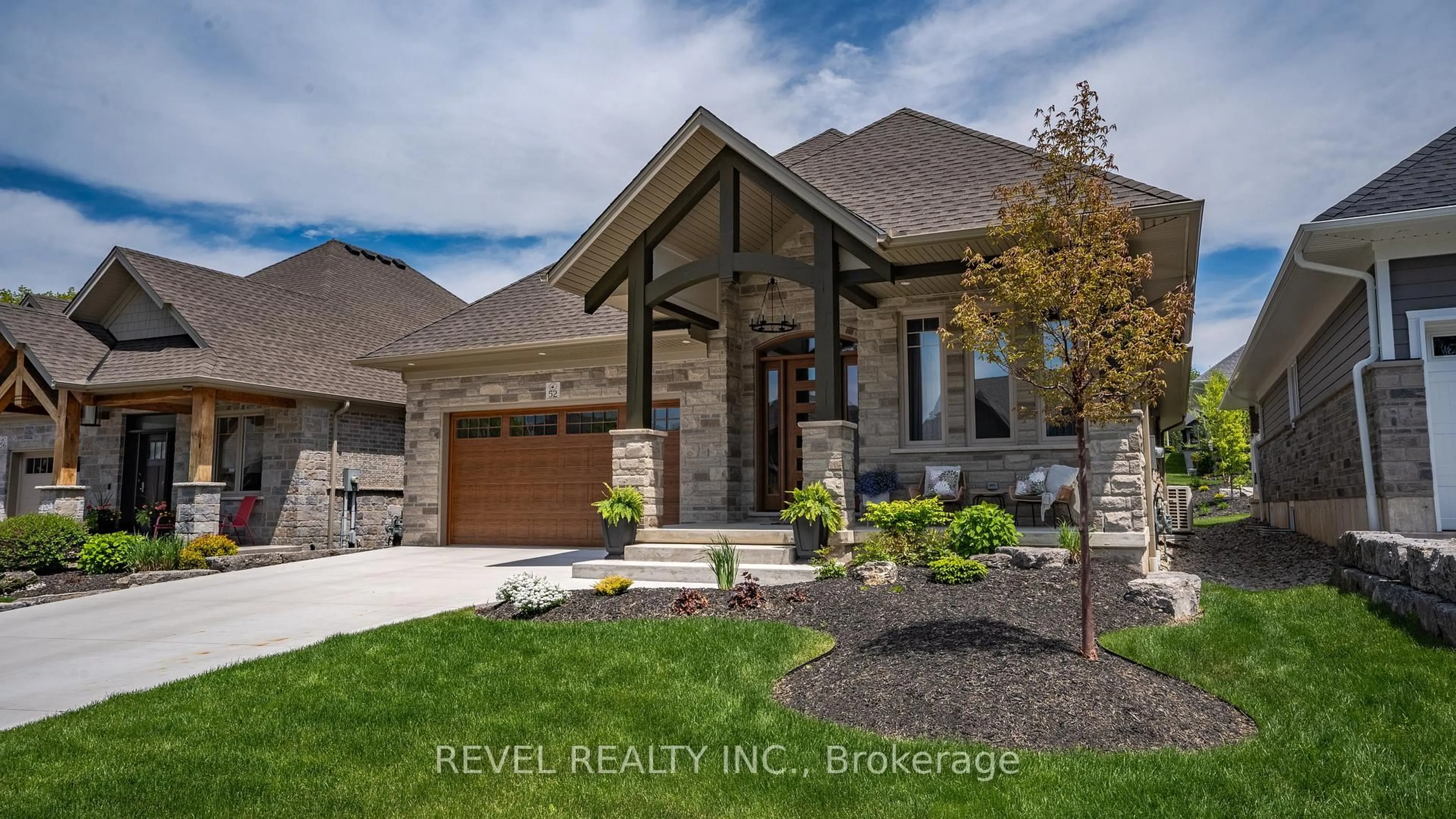 Home with brick exterior material, street for 52 Beechnut Lane, Norfolk Ontario N0A 1N7