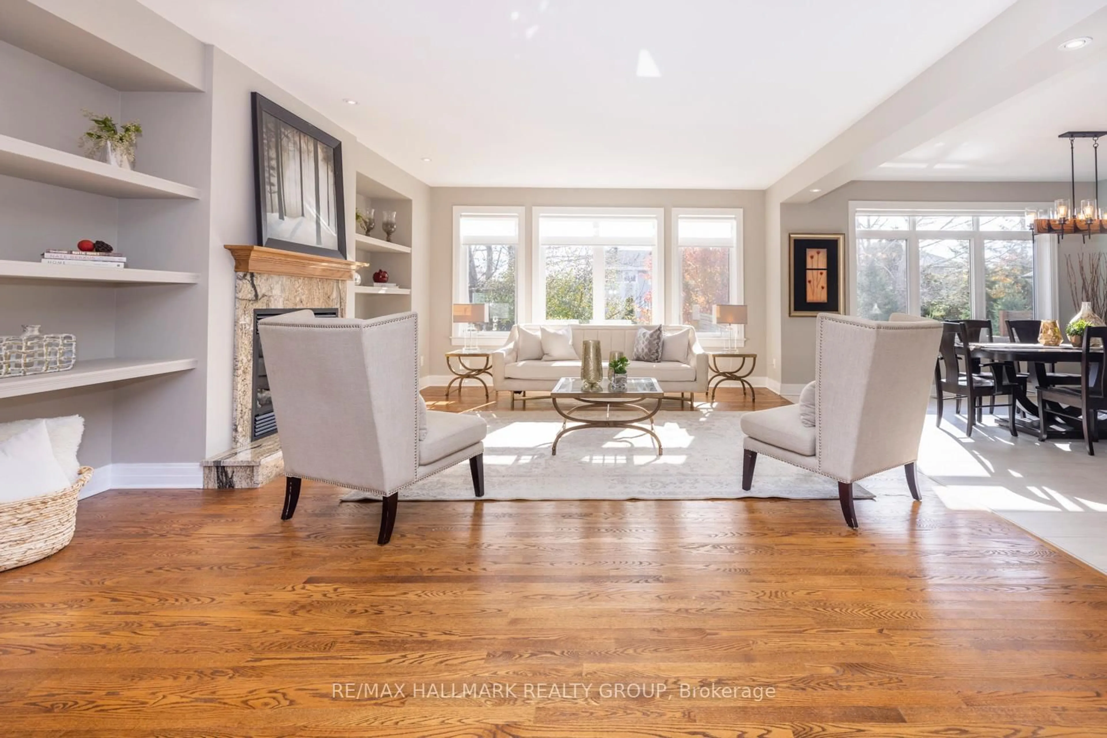 Living room with furniture, wood/laminate floor for 206 CEDARSTONE St, Richmond Ontario K0A 2Z0