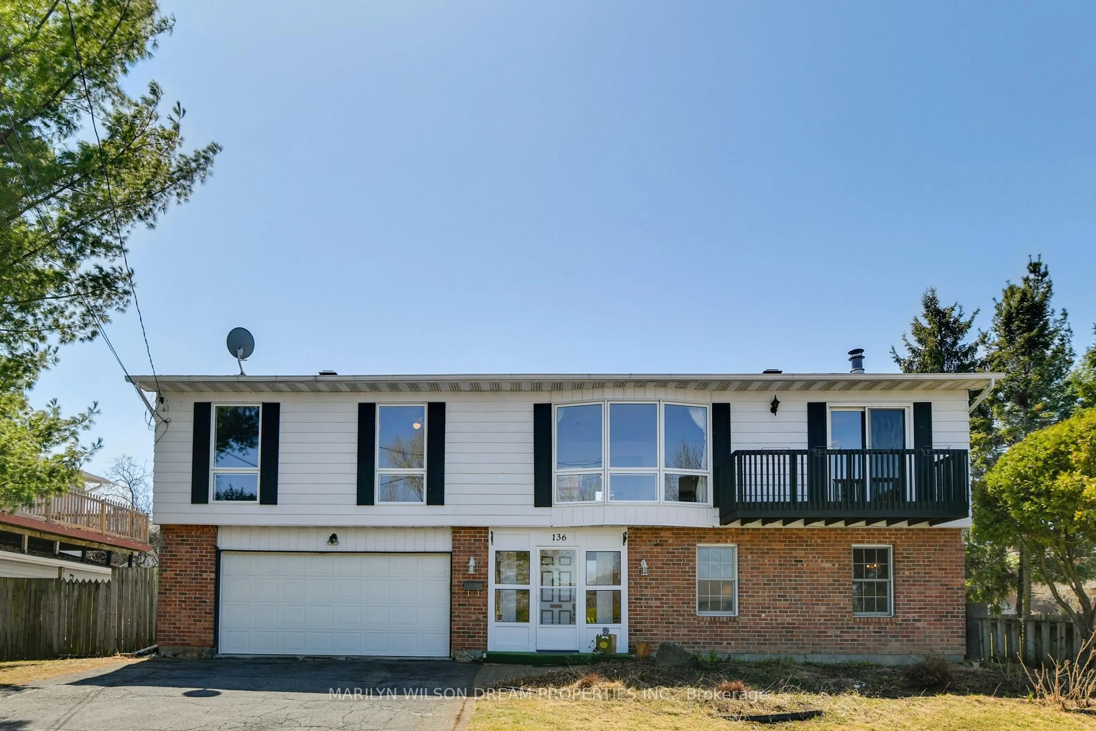 Home with vinyl exterior material, street for 136 James Cummings Ave, Ottawa Ontario K2H 8E1