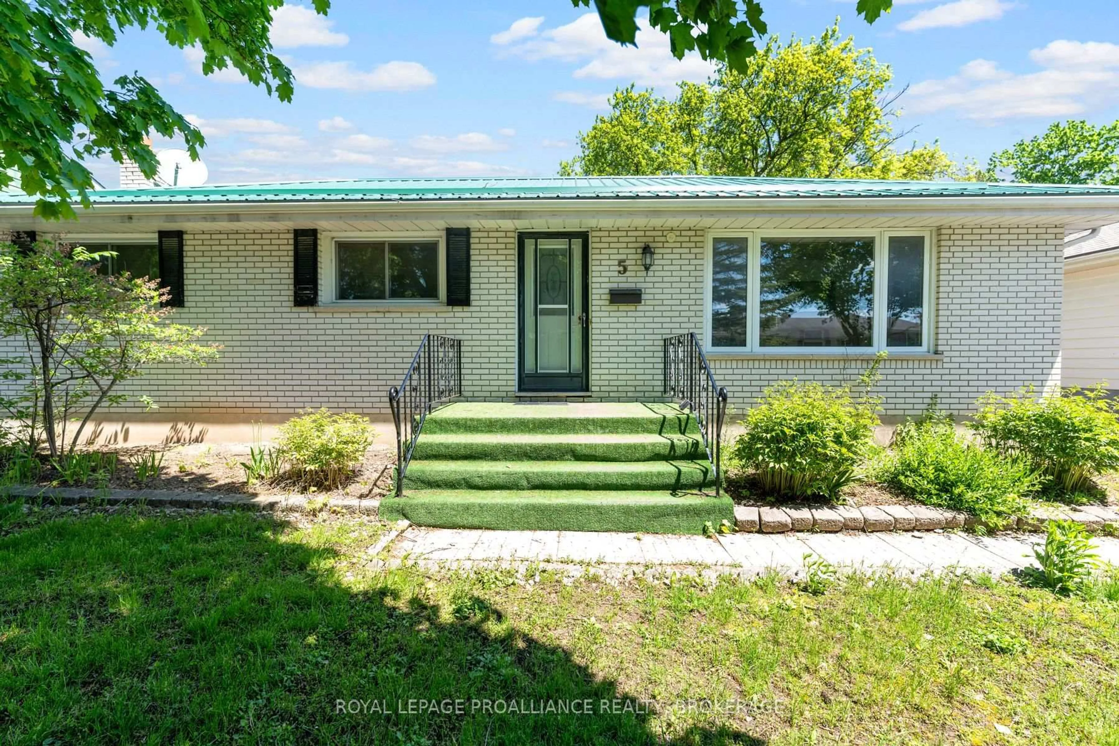 Home with vinyl exterior material, street for 5 Armour Cres, Quinte West Ontario K8V 2V9