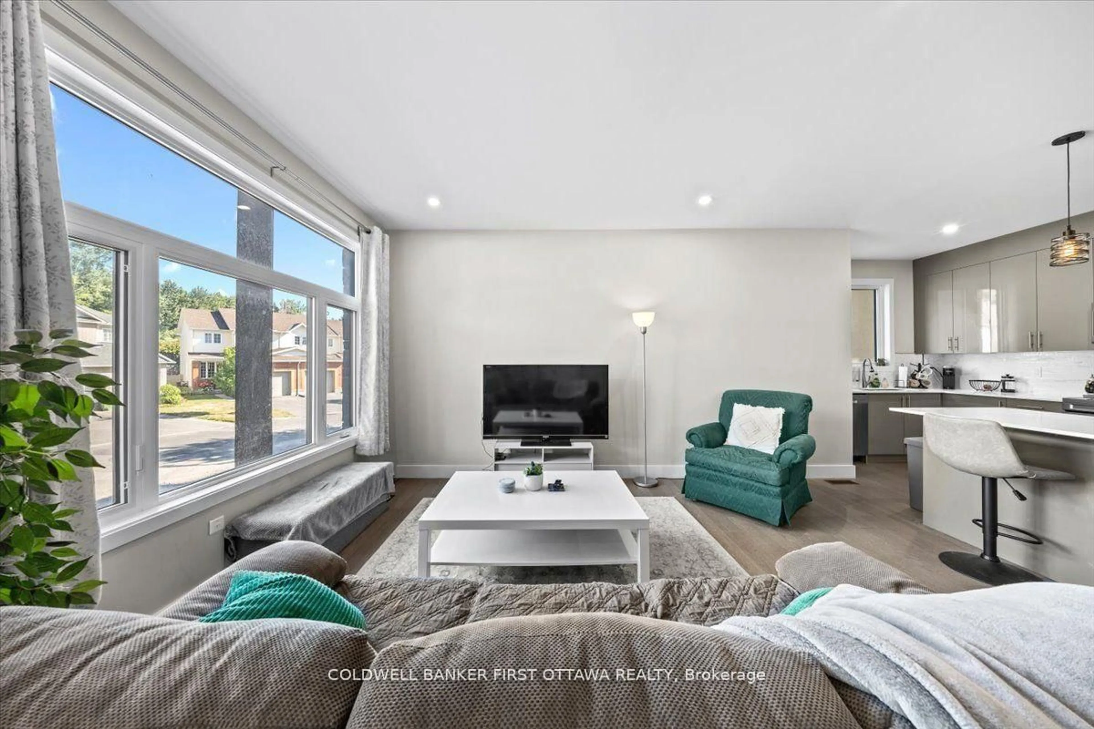 Living room with furniture, unknown for 25 Pennard Way #A & B, Ottawa Ontario K1T 4C1