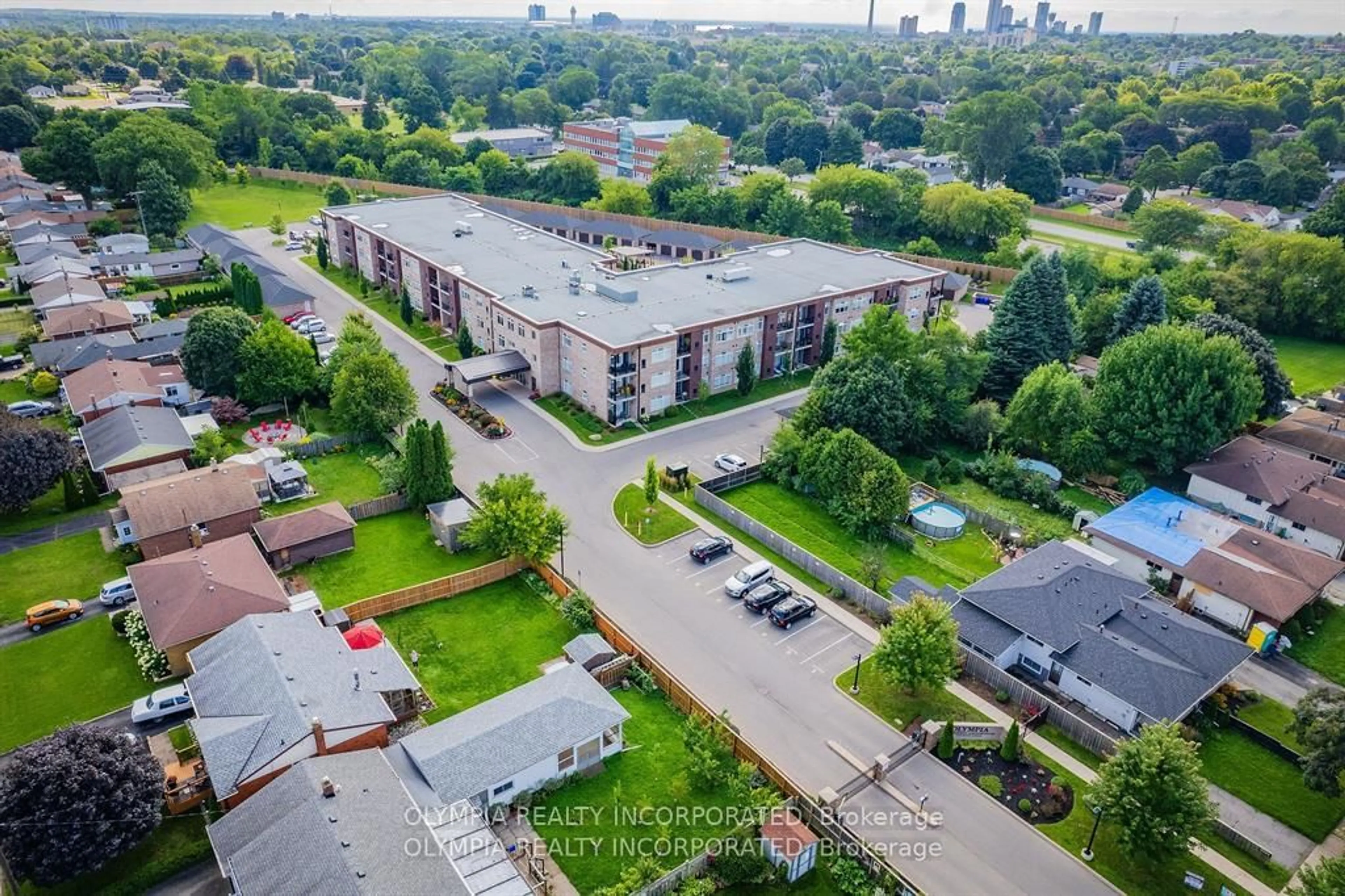 A pic from outside/outdoor area/front of a property/back of a property/a pic from drone, city buildings view from balcony for 4464 Pettit Ave #117, Niagara Falls Ontario L2E 0B4