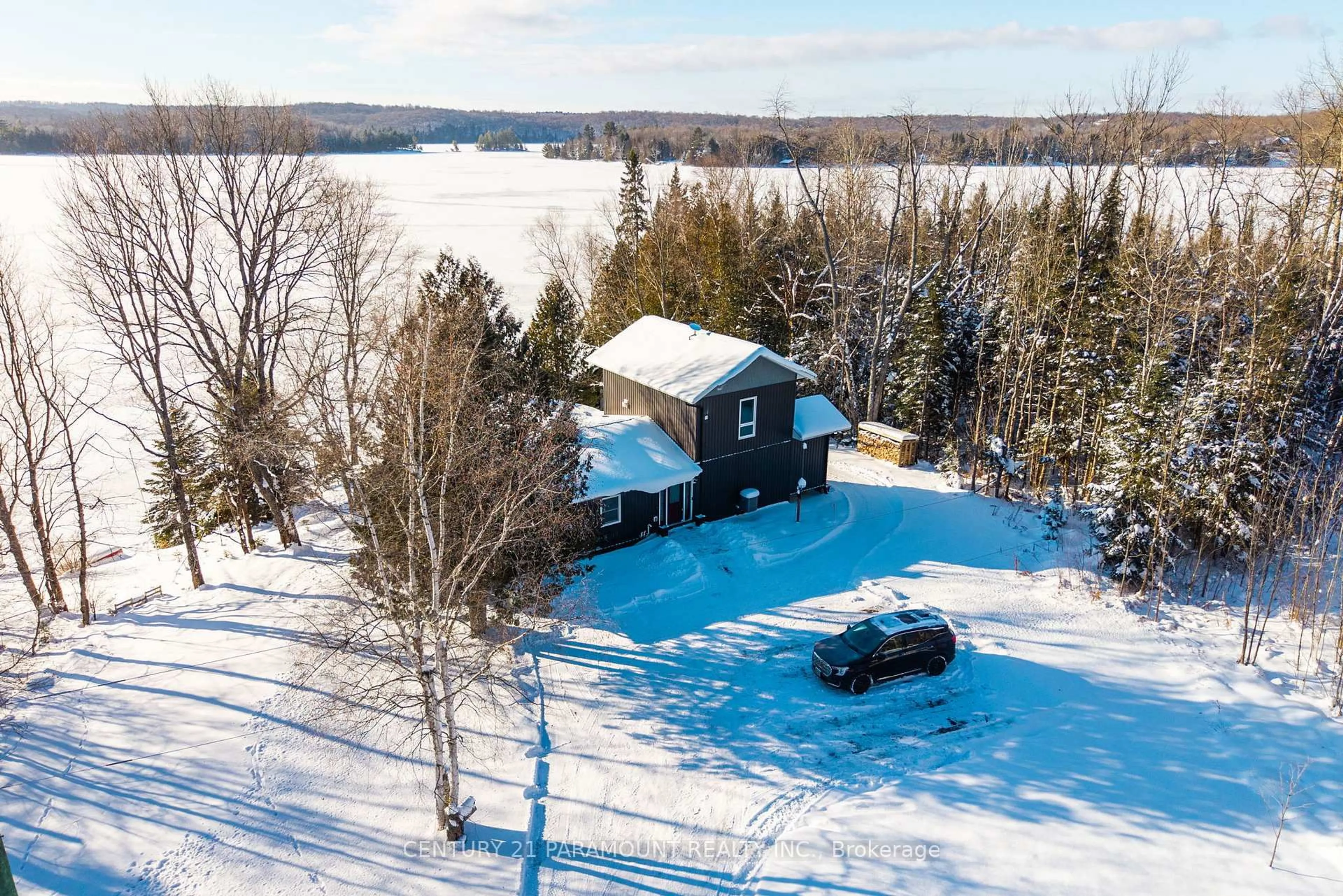 A pic from outside/outdoor area/front of a property/back of a property/a pic from drone, water/lake/river/ocean view for 126 CHAPMAN Dr, Magnetawan Ontario P0A 1P0