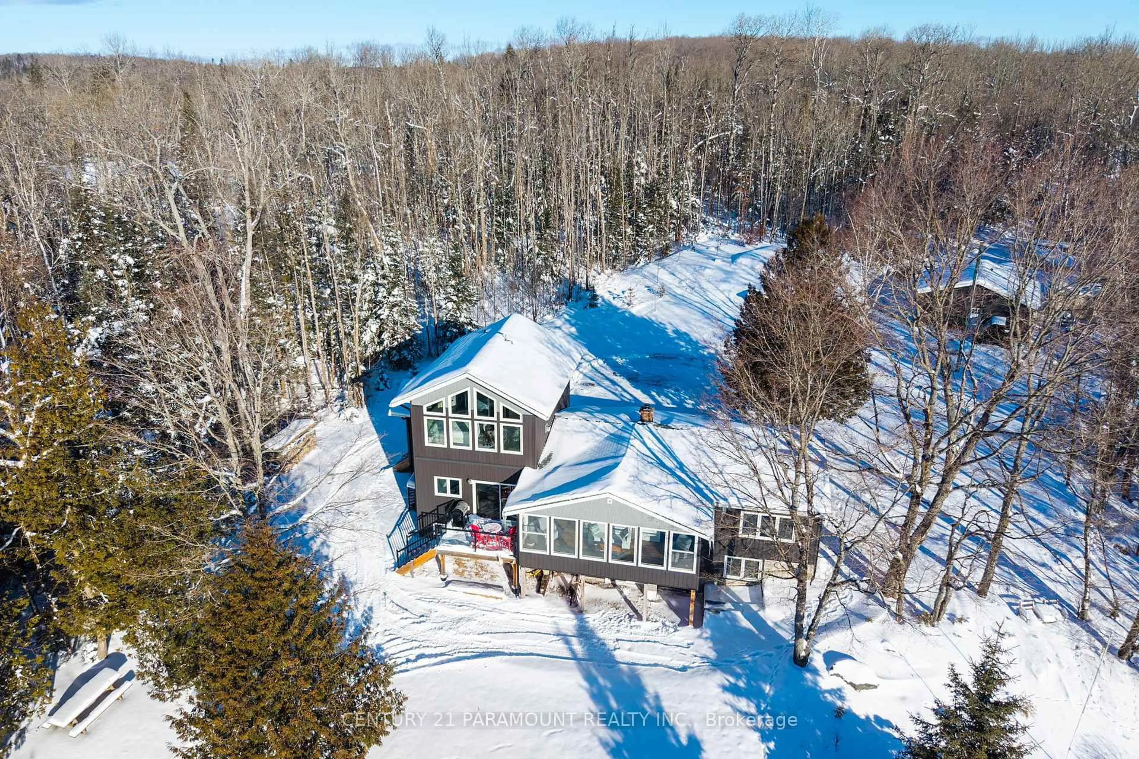 A pic from outside/outdoor area/front of a property/back of a property/a pic from drone, unknown for 126 CHAPMAN Dr, Magnetawan Ontario P0A 1P0