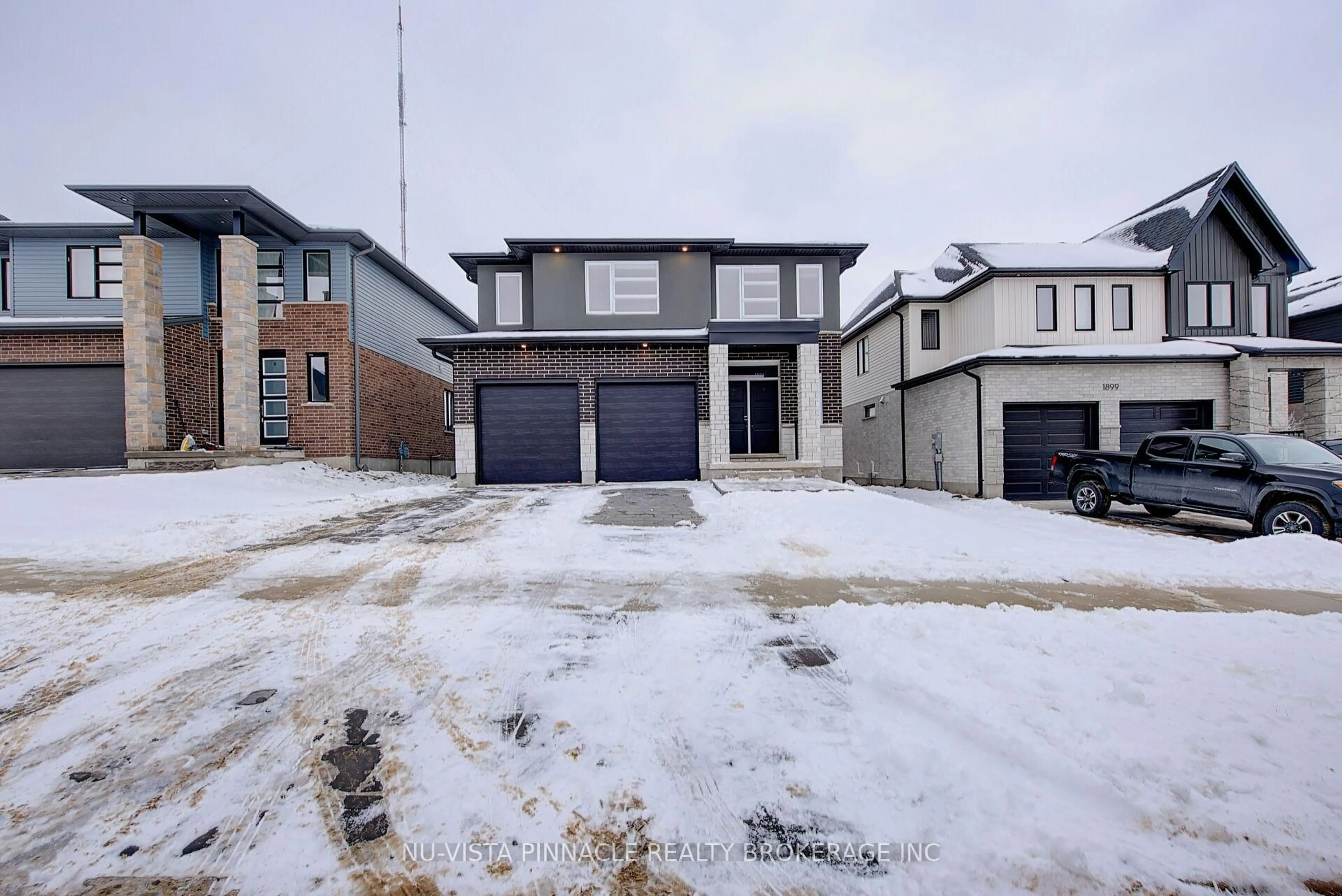 A pic from outside/outdoor area/front of a property/back of a property/a pic from drone, street for 1895 FOUNTAIN GRASS Dr, London South Ontario N6K 0M2