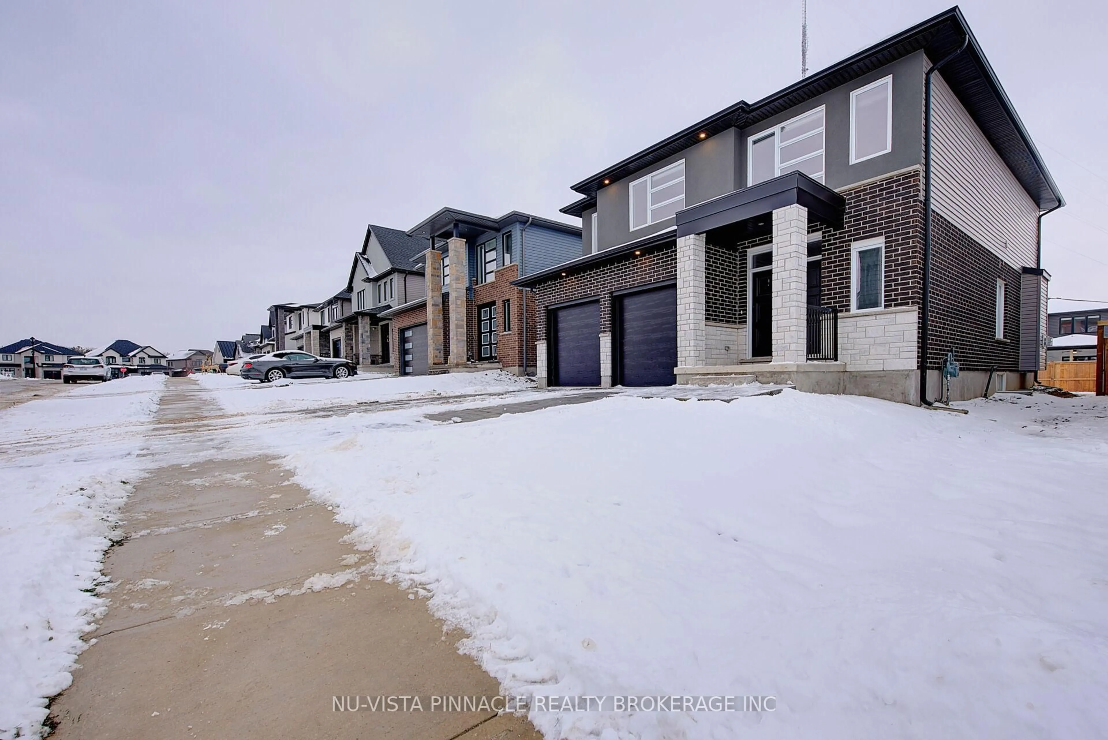 A pic from outside/outdoor area/front of a property/back of a property/a pic from drone, street for 1895 FOUNTAIN GRASS Dr, London South Ontario N6K 0M2