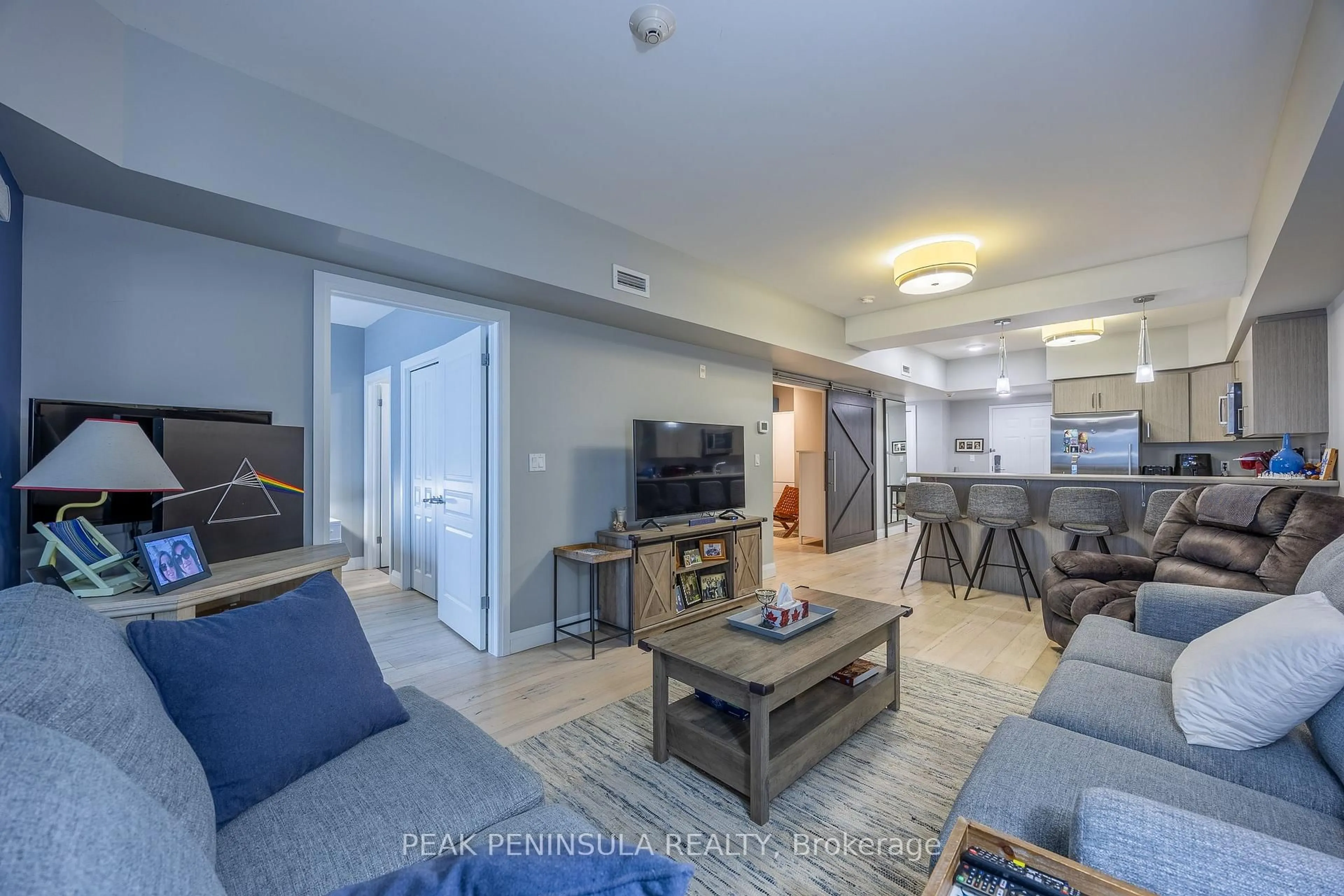 Living room with furniture, unknown for 12 Erie Blvd #208, Norfolk Ontario N0E 1M0