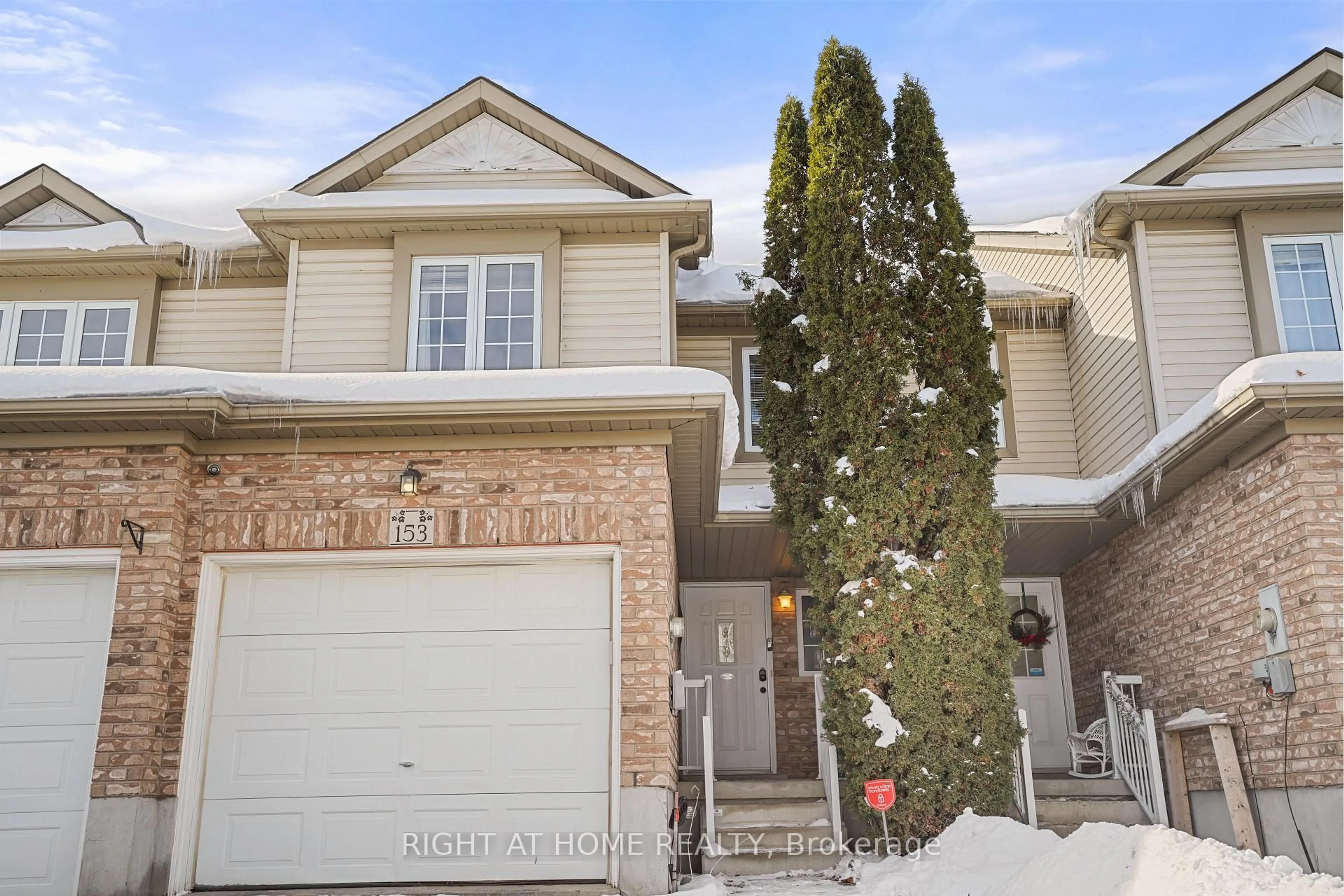 Home with brick exterior material, street for 153 Donnenwerth Dr, Kitchener Ontario N2E 4C8