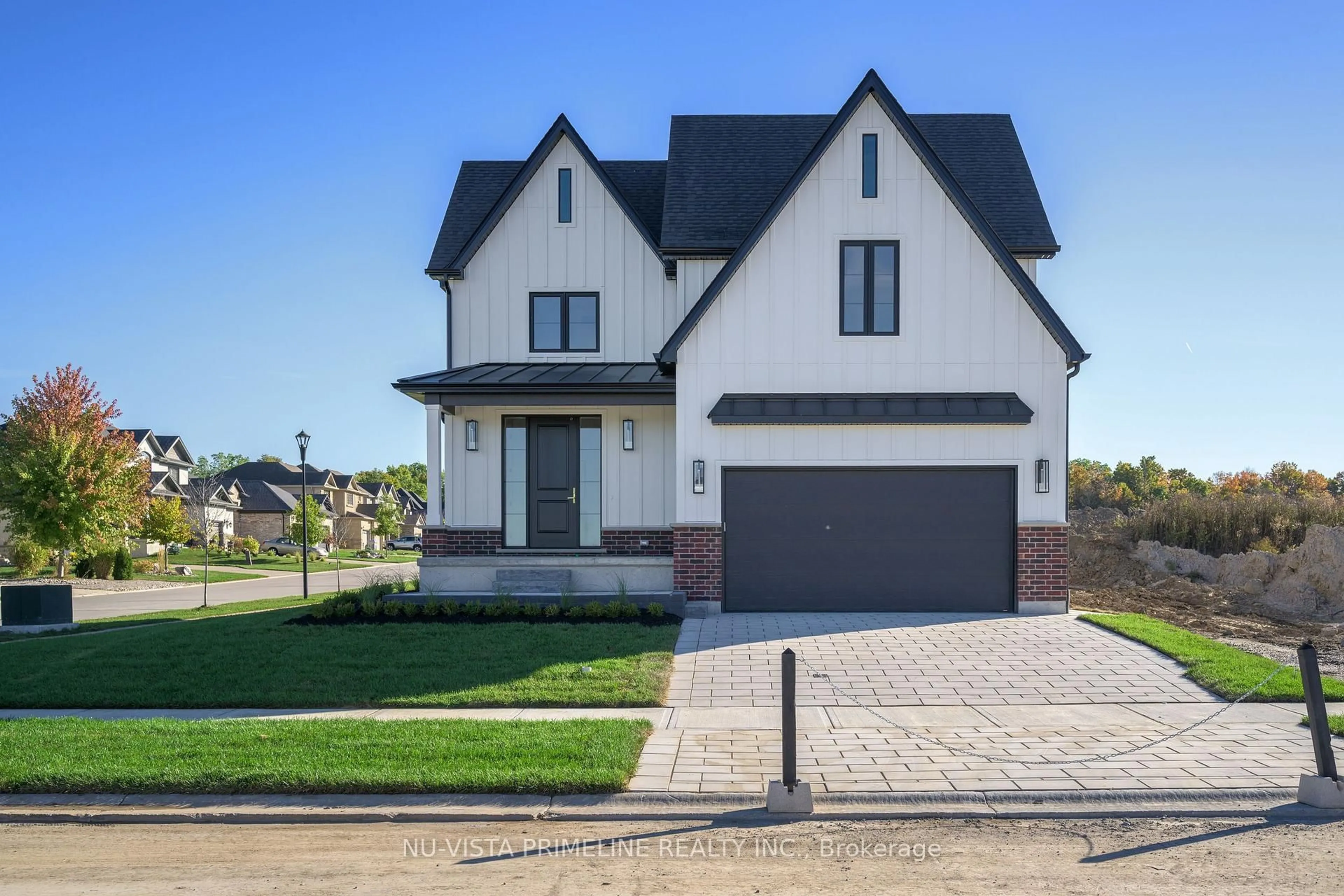 Home with brick exterior material, street for 199 Timberwalk Tr, Middlesex Centre Ontario N0M 2A0