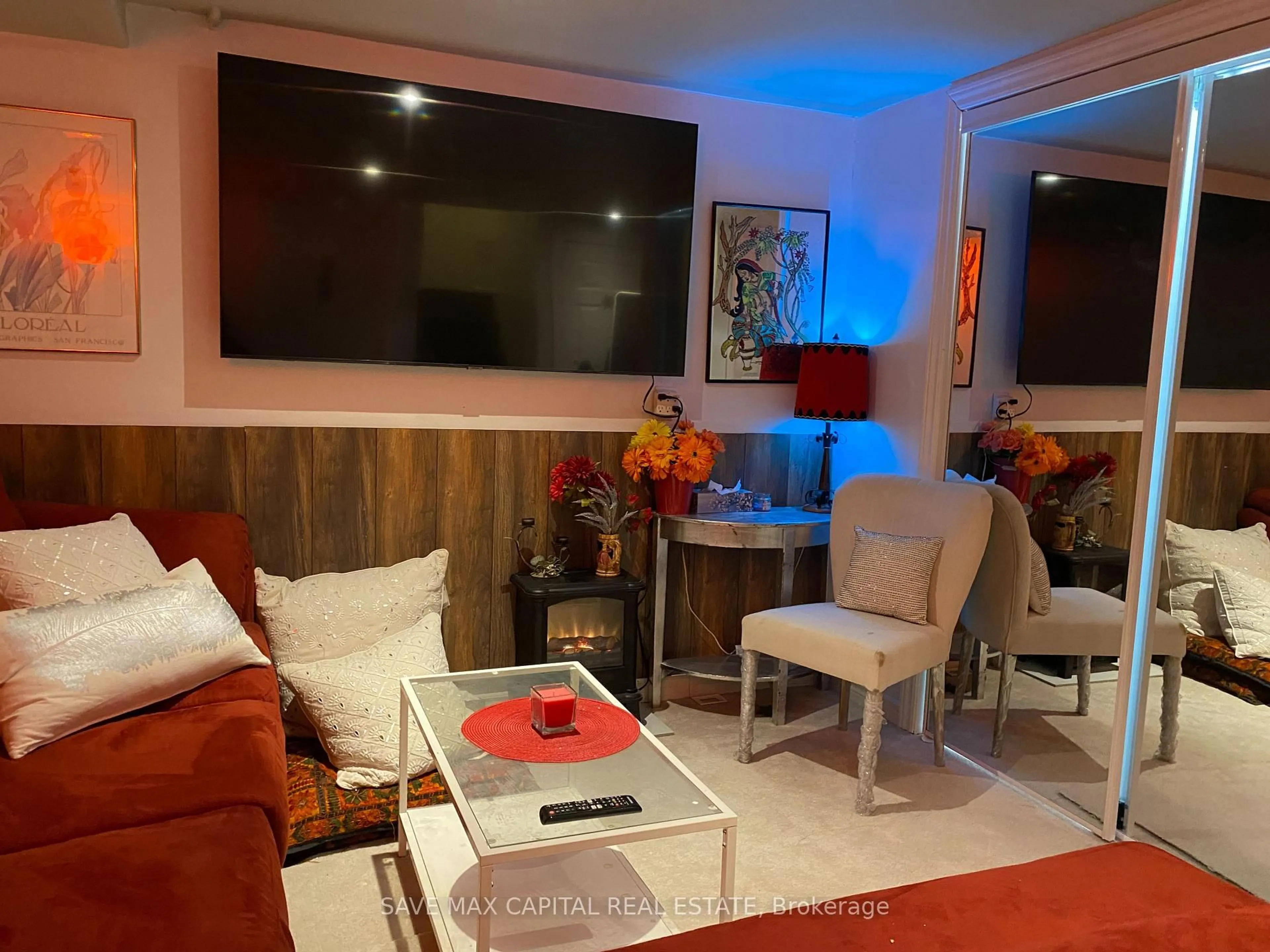 Living room with furniture, wood/laminate floor for 5966 Frontenac St, Niagara Falls Ontario L2G 3B2