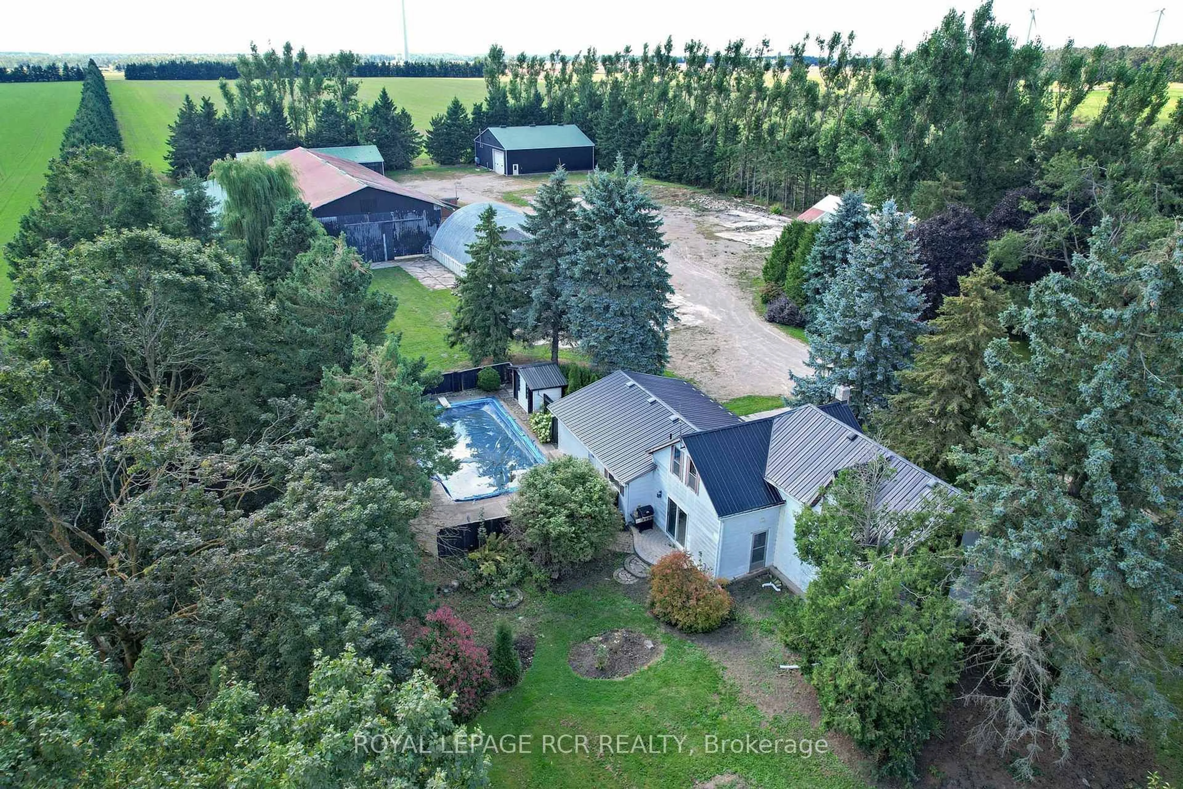 A pic from outside/outdoor area/front of a property/back of a property/a pic from drone, forest/trees view for 518156 124 Highway, Melancthon Ontario L9V 1V9
