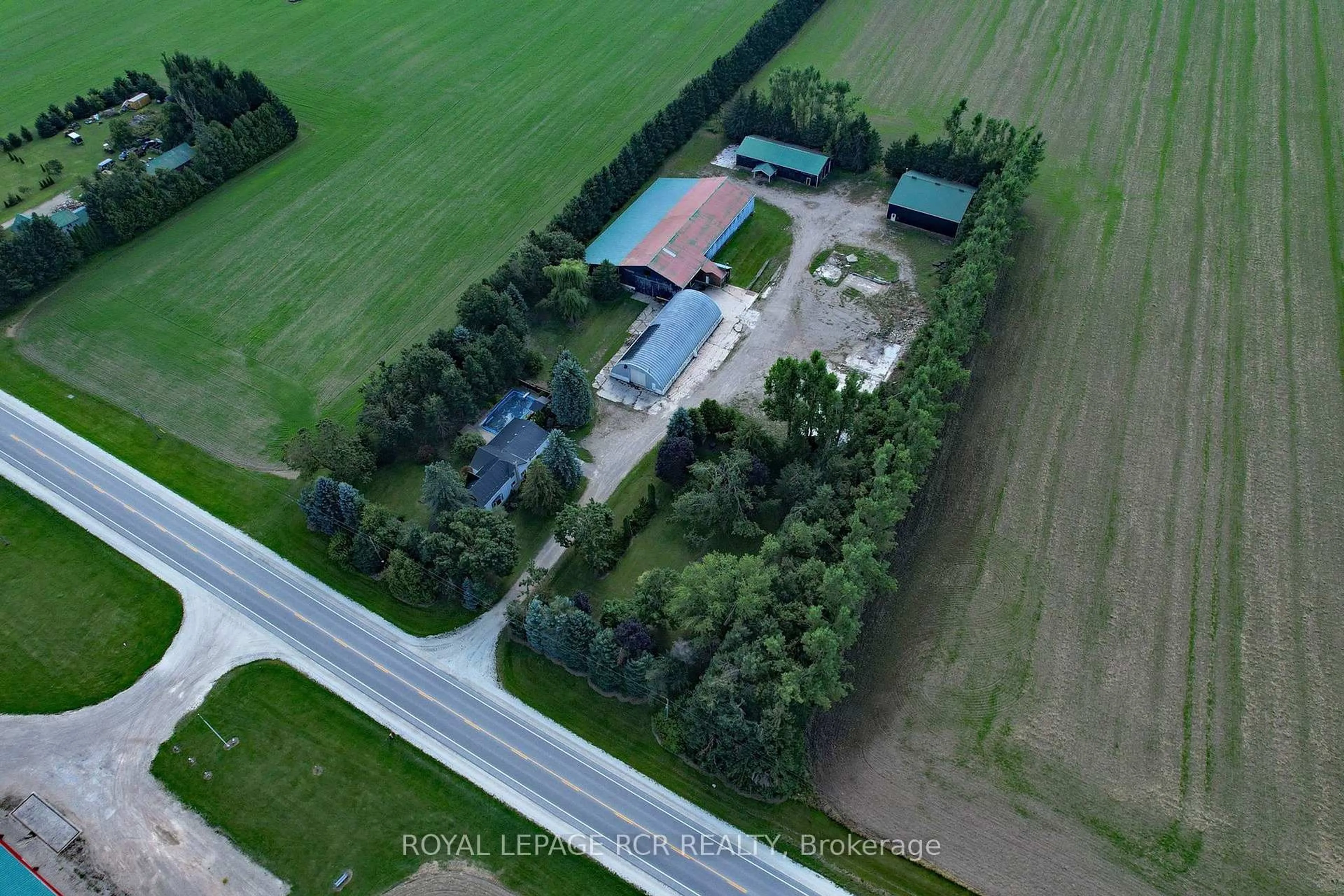 A pic from outside/outdoor area/front of a property/back of a property/a pic from drone, street for 518156 124 Highway, Melancthon Ontario L9V 1V9