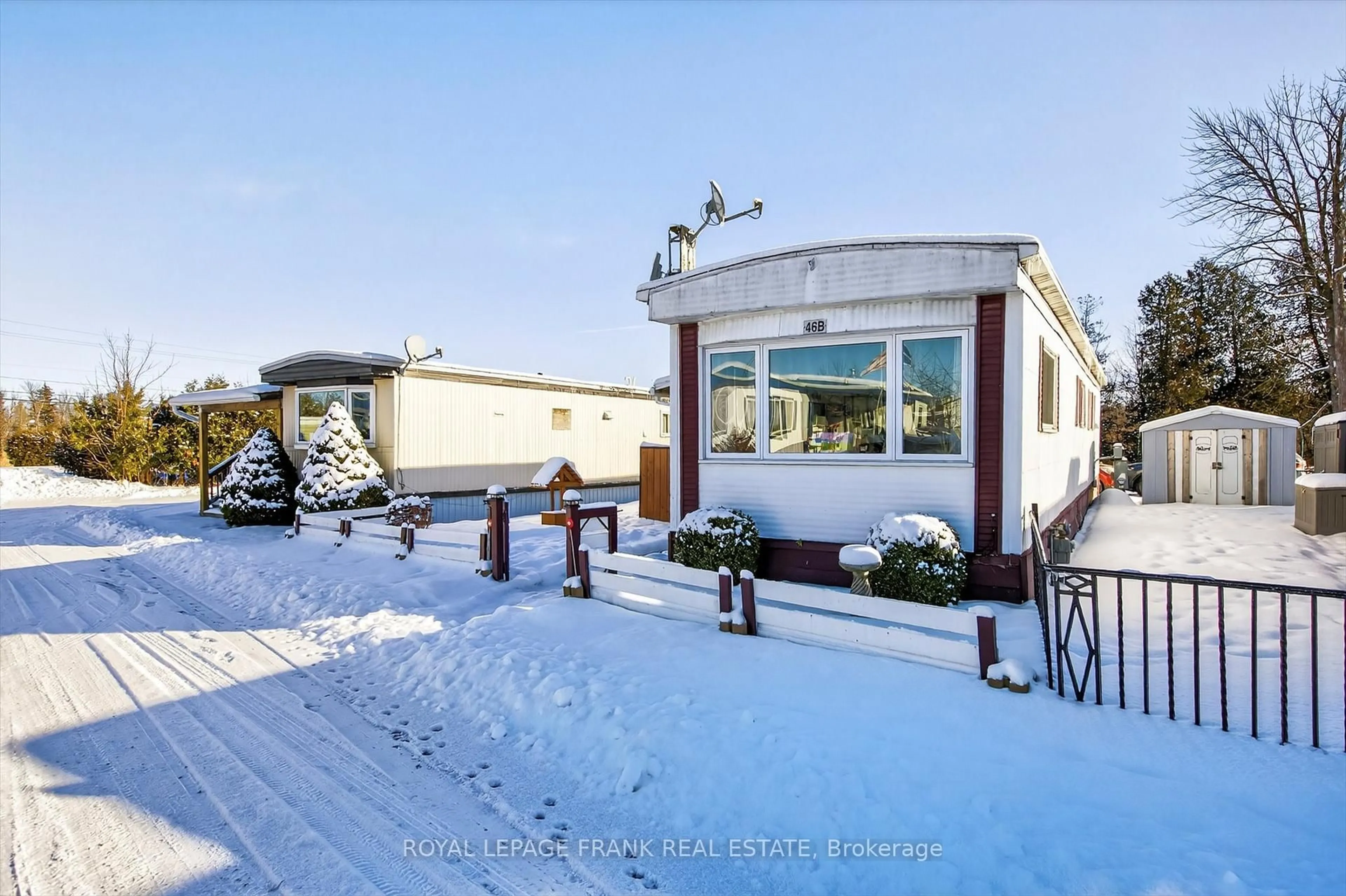 A pic from outside/outdoor area/front of a property/back of a property/a pic from drone, street for 2244 Heritage Line #46B, Otonabee-South Monaghan Ontario K9J 6X8
