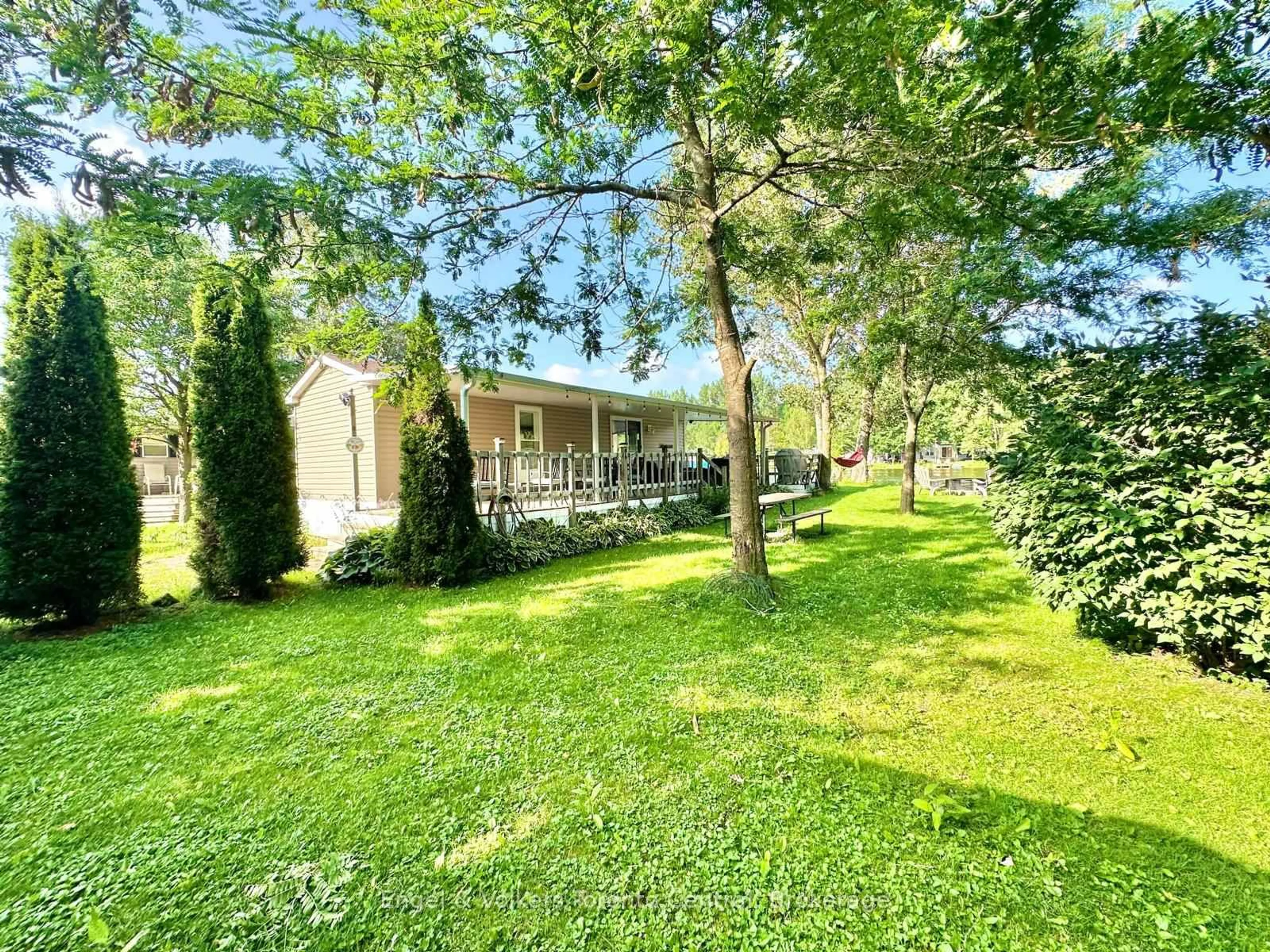 A pic from outside/outdoor area/front of a property/back of a property/a pic from drone, forest/trees view for 7489 SIDEROAD 5 #B8, Wellington North Ontario N0G 2L0