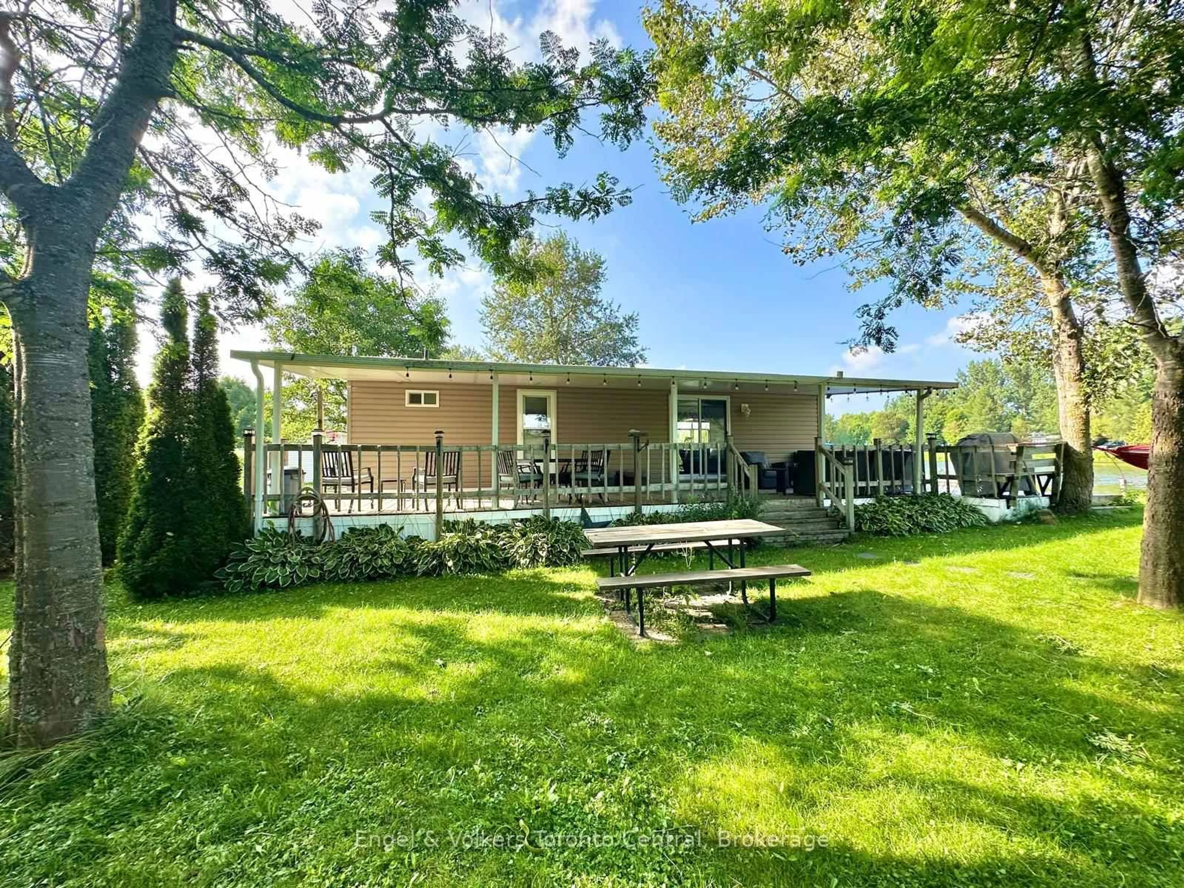 A pic from outside/outdoor area/front of a property/back of a property/a pic from drone, water/lake/river/ocean view for 7489 SIDEROAD 5 #B8, Wellington North Ontario N0G 2L0